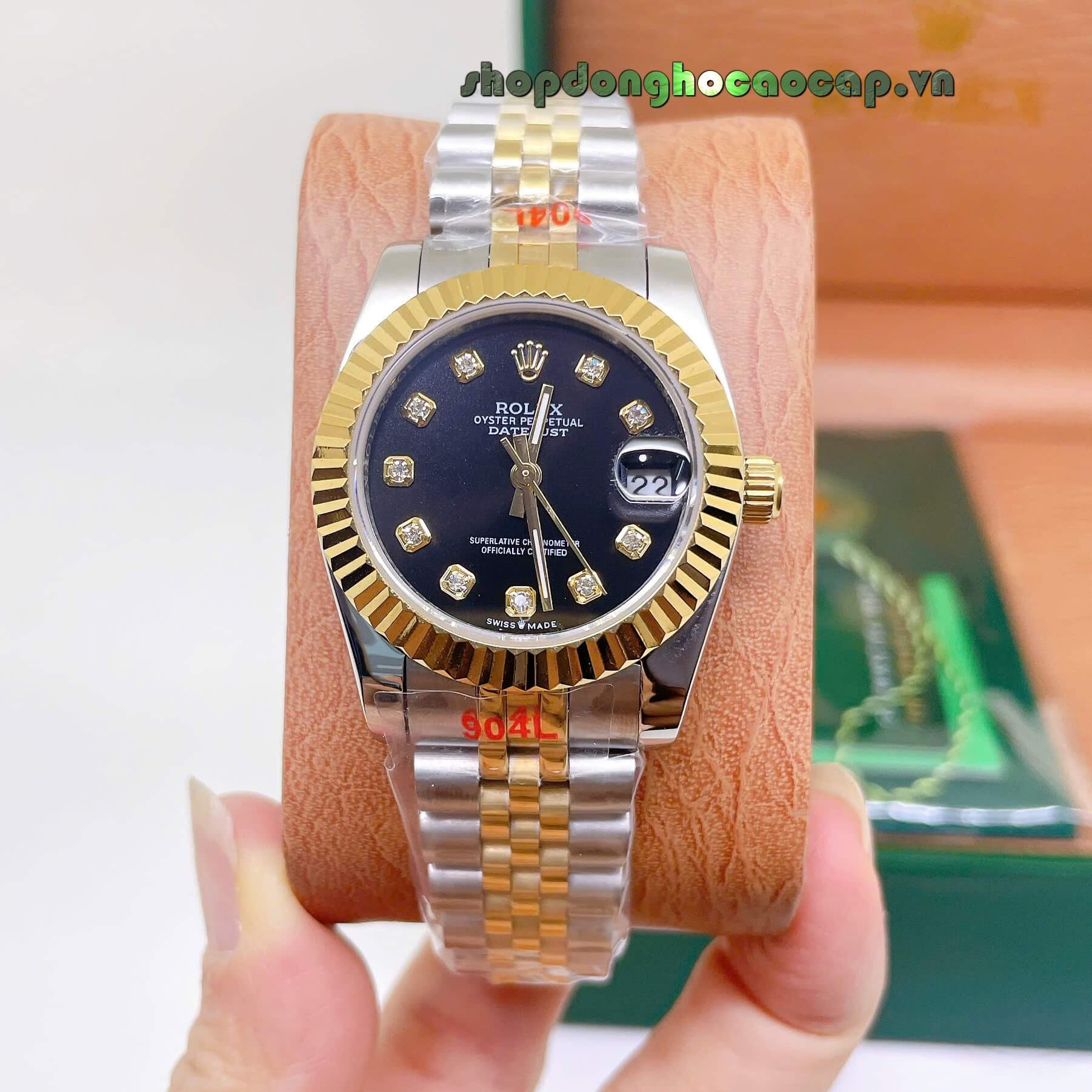 Đồng Hồ Rolex Datejust Nữ Máy Pin Dây Kim Loại Demi Vàng Mặt Đen Niềng Khía Size 31mm