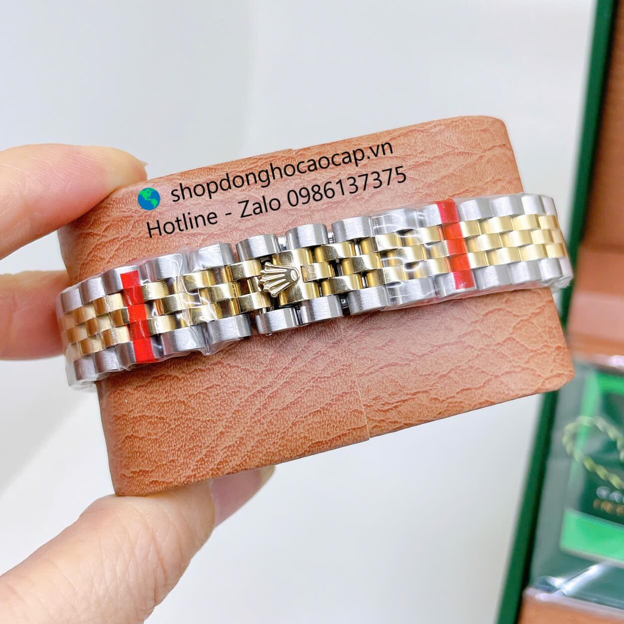 Đồng Hồ Rolex Datejust Nữ Máy Pin Dây Kim Loại Demi Vàng Mặt Trắng Xà Cừ Niềng Khía Size 31mm