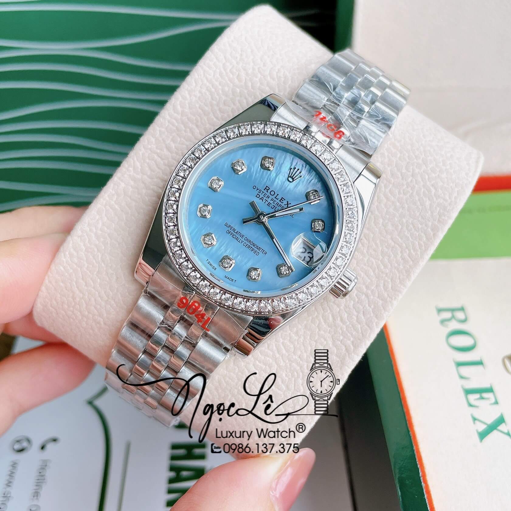 Đồng Hồ Nữ Rolex Datejust Pin Màu Vàng Mặt Xanh Dương Xà Cừ Đính Đá Size 32mm Full Box