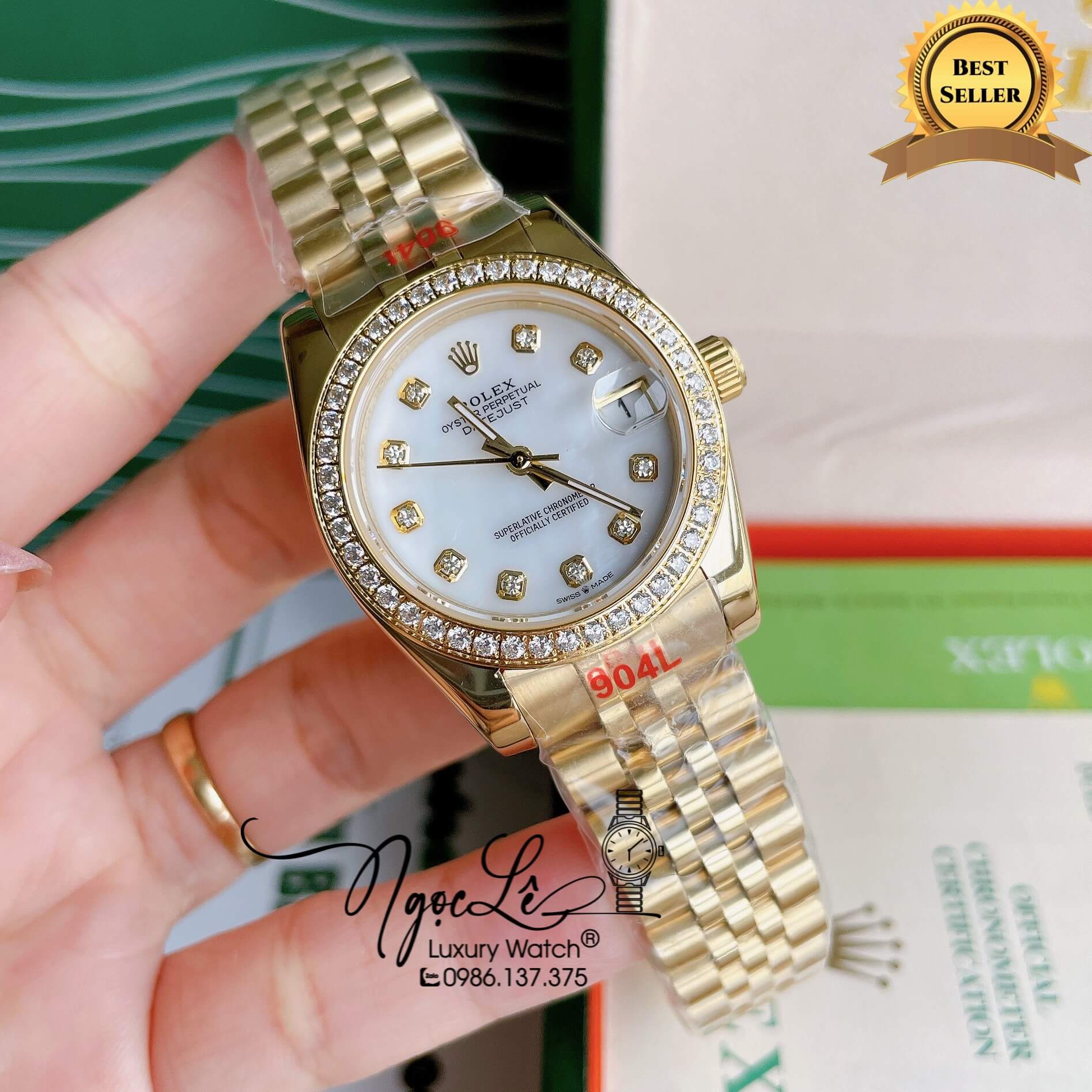 Đồng Hồ Nữ Rolex Datejust Pin Màu Vàng Mặt Trắng Xà Cừ Đính Đá Size 32mm Full Box
