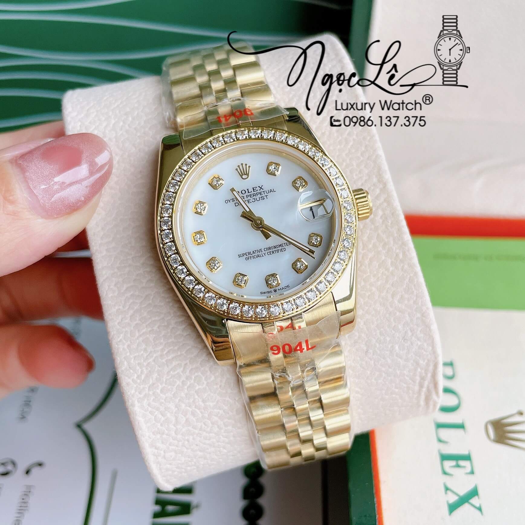 Đồng Hồ Nữ Rolex Datejust Pin Màu Vàng Mặt Trắng Xà Cừ Đính Đá Size 32mm Full Box