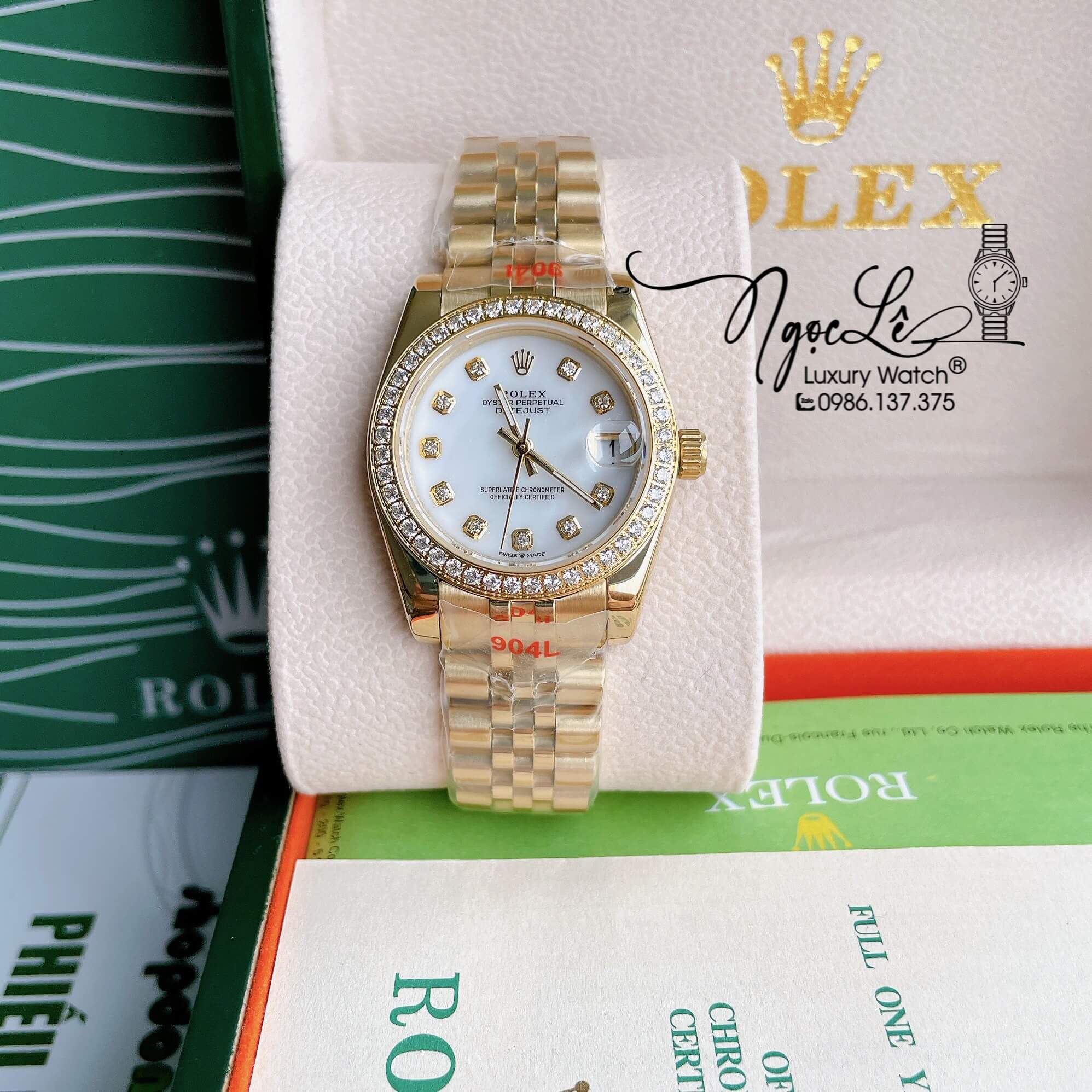 Đồng Hồ Nữ Rolex Datejust Pin Màu Vàng Mặt Trắng Xà Cừ Đính Đá Size 32mm Full Box