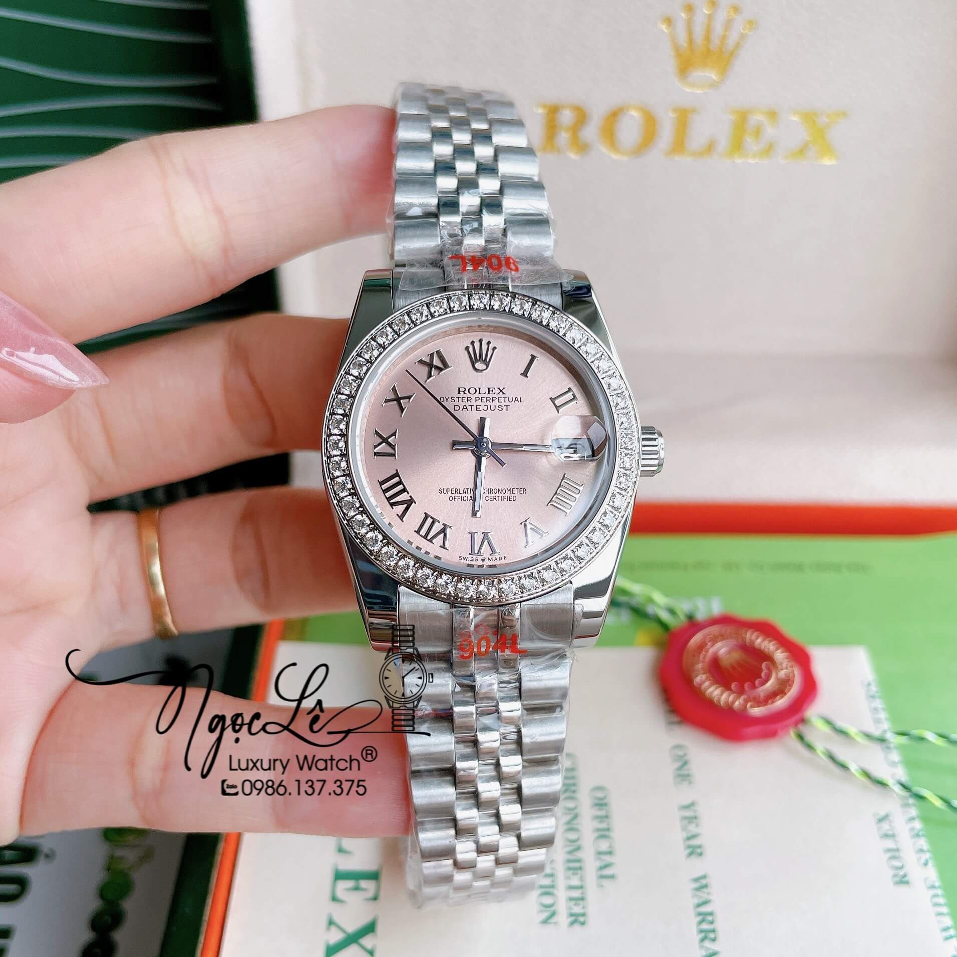 Đồng Hồ Nữ Rolex Datejust Pin Màu Bạc Mặt Hồng Nhạt Đính Đá Size 32mm Full Box