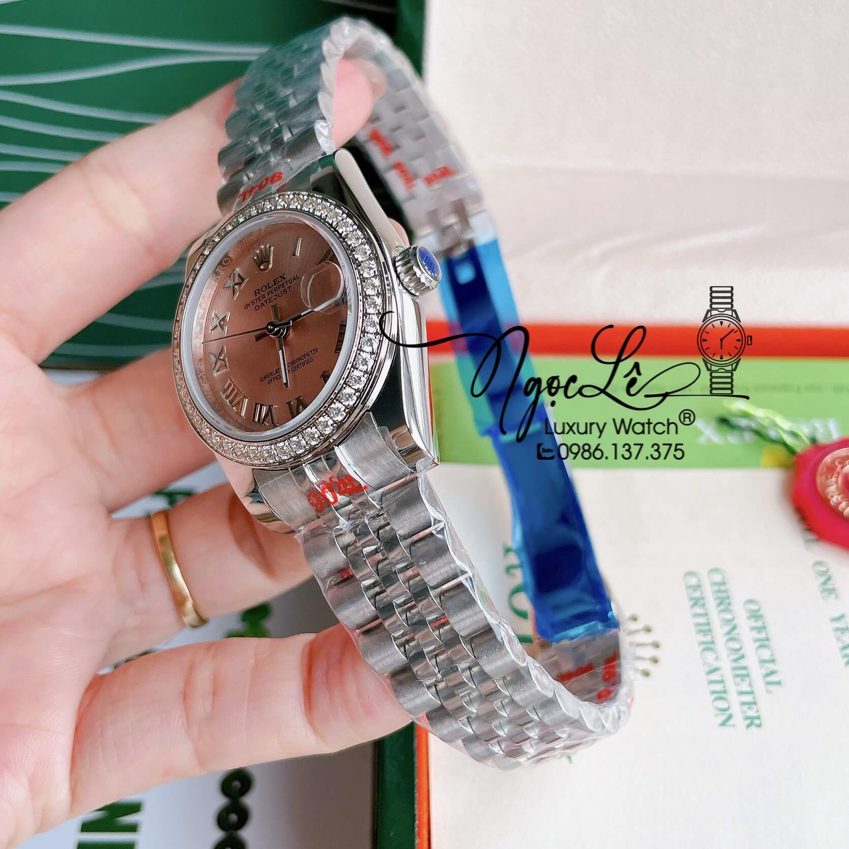 Đồng Hồ Nữ Rolex Datejust Pin Màu Bạc Mặt Hồng Nhạt Đính Đá Size 32mm Full Box