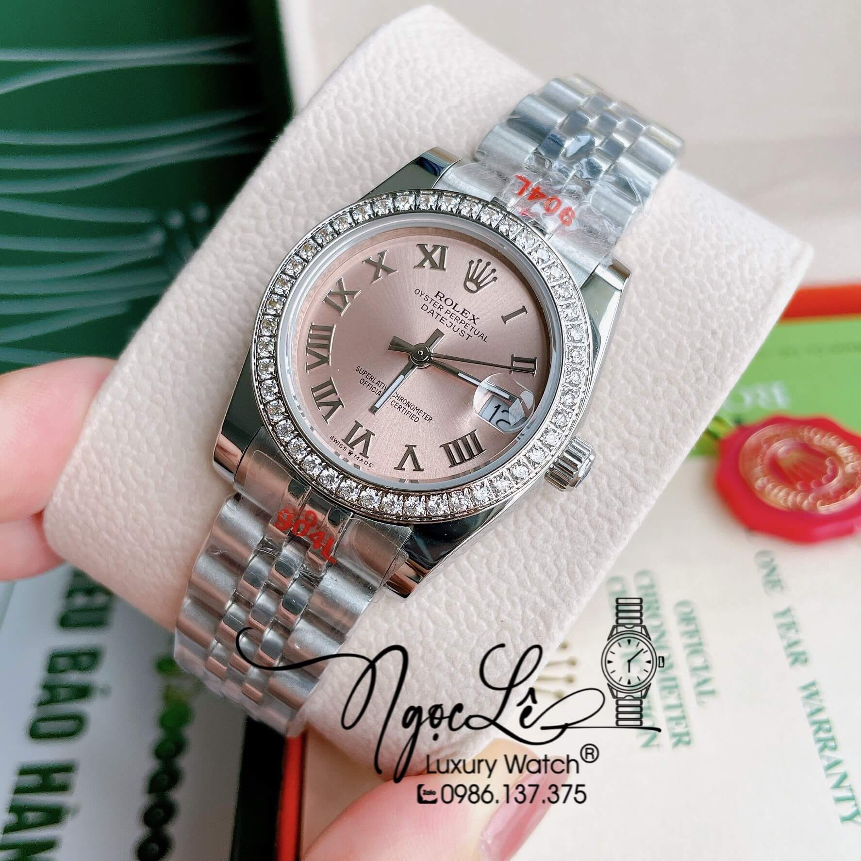Đồng Hồ Nữ Rolex Datejust Pin Màu Bạc Mặt Hồng Nhạt Đính Đá Size 32mm Full Box