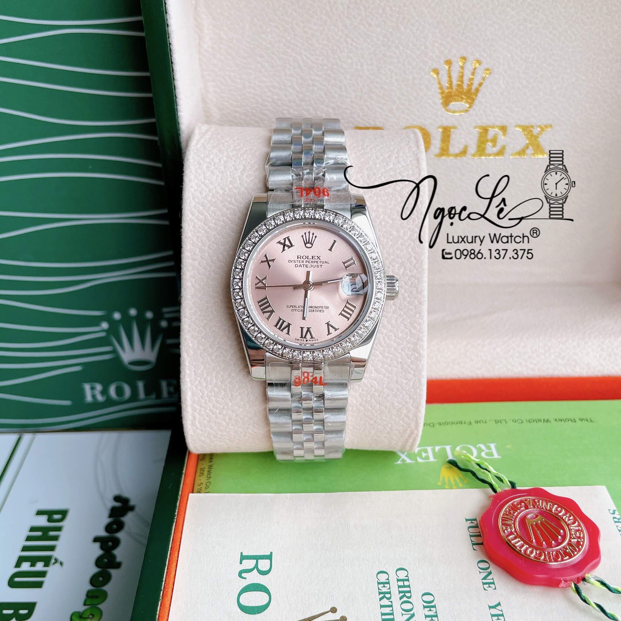 Đồng Hồ Nữ Rolex Datejust Pin Màu Bạc Mặt Hồng Nhạt Đính Đá Size 32mm Full Box