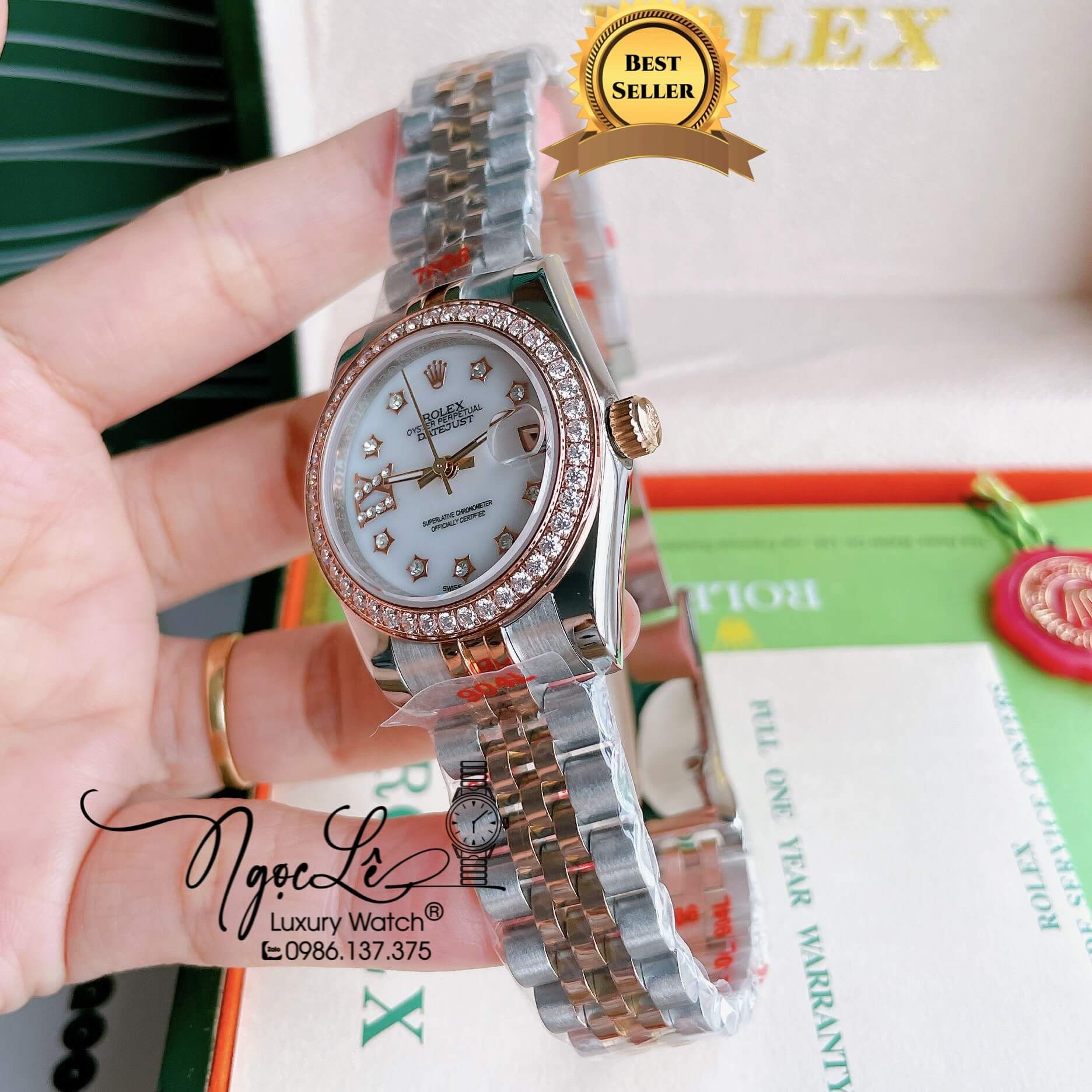 Đồng Hồ Nữ Rolex Datejust Pin Màu Demi Rose Mặt Trắng Xà Cừ Đính Đá Size 32mm