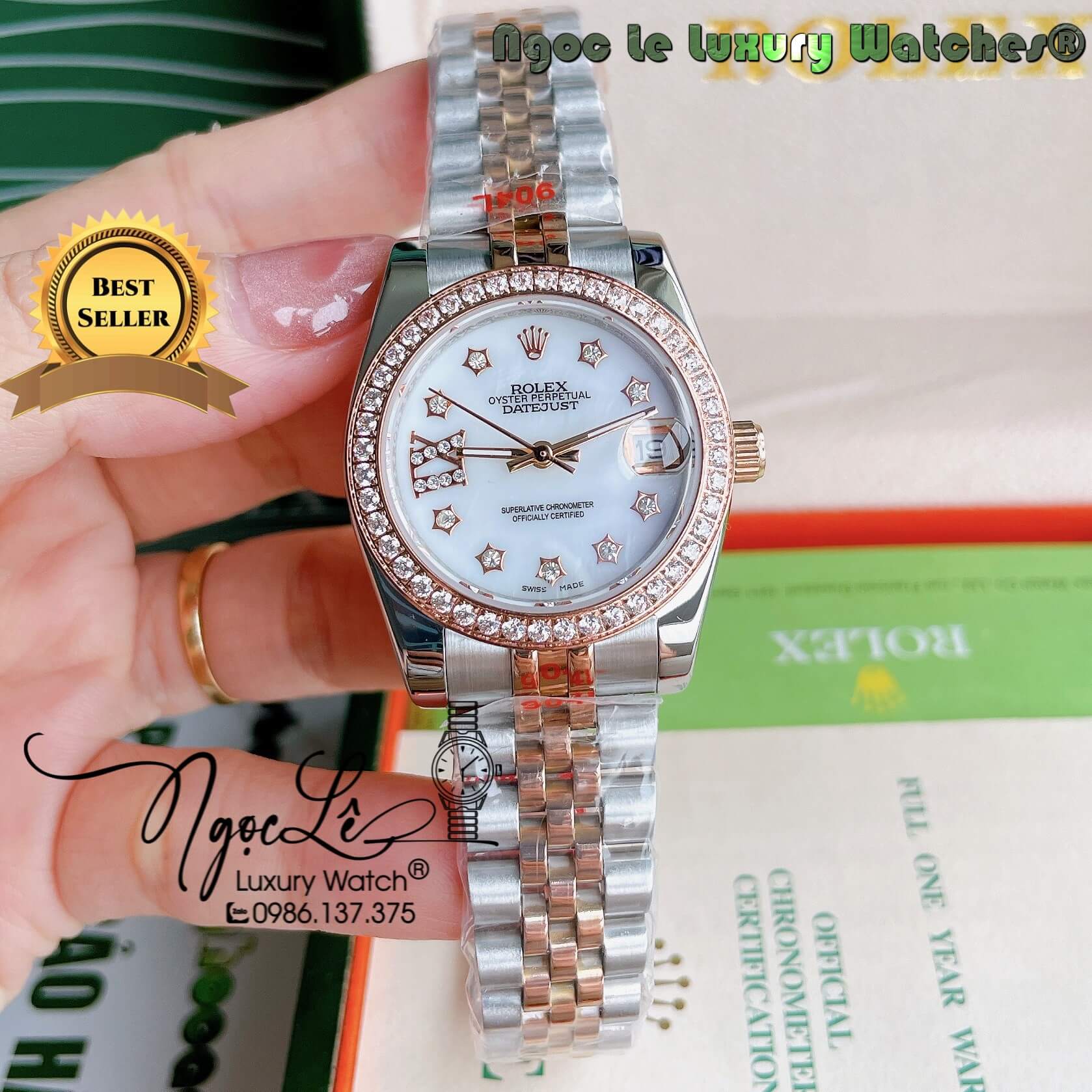 Đồng Hồ Nữ Rolex Datejust Pin Màu Demi Rose Mặt Trắng Xà Cừ Đính Đá Size 32mm