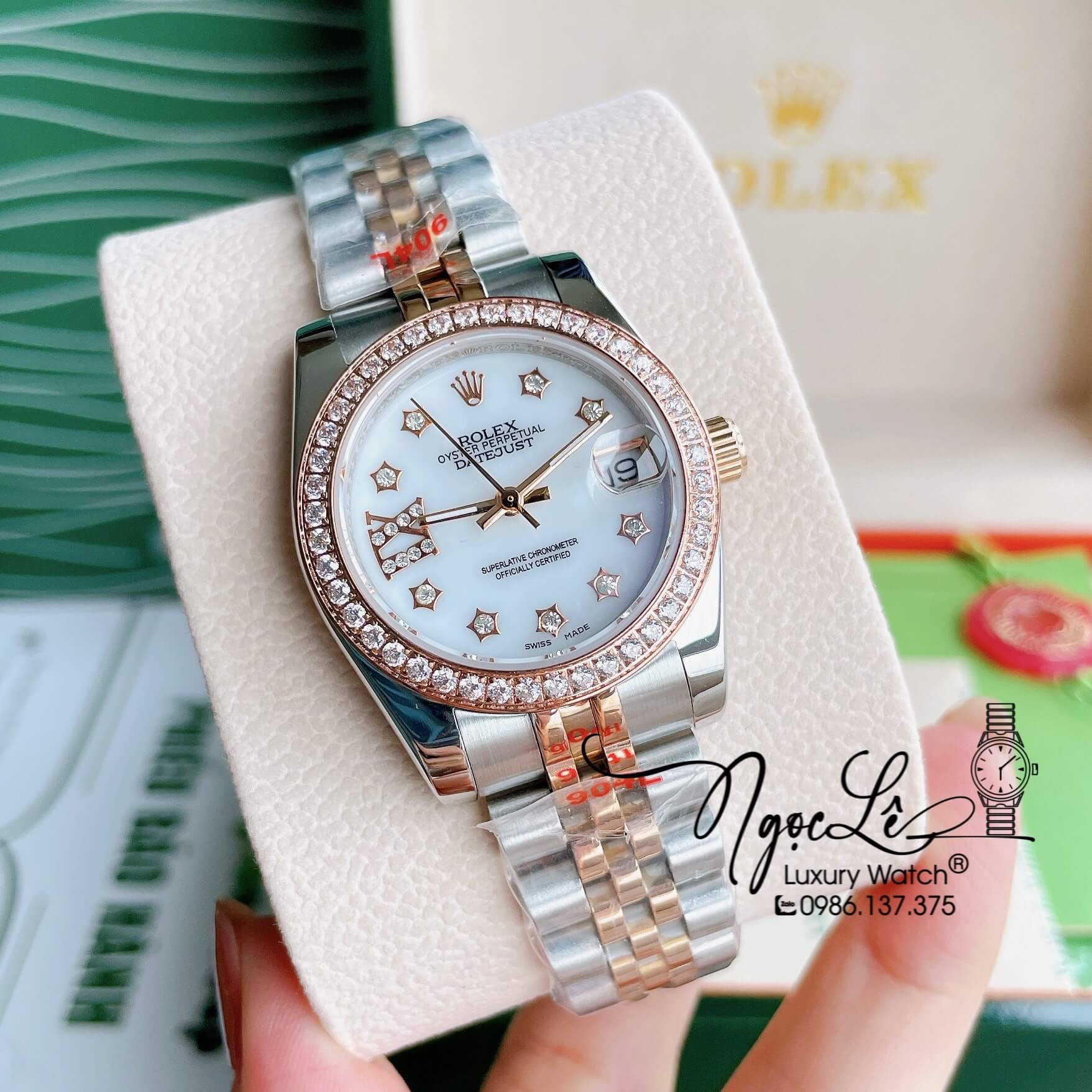 Đồng Hồ Nữ Rolex Datejust Pin Màu Demi Rose Mặt Trắng Xà Cừ Đính Đá Size 32mm