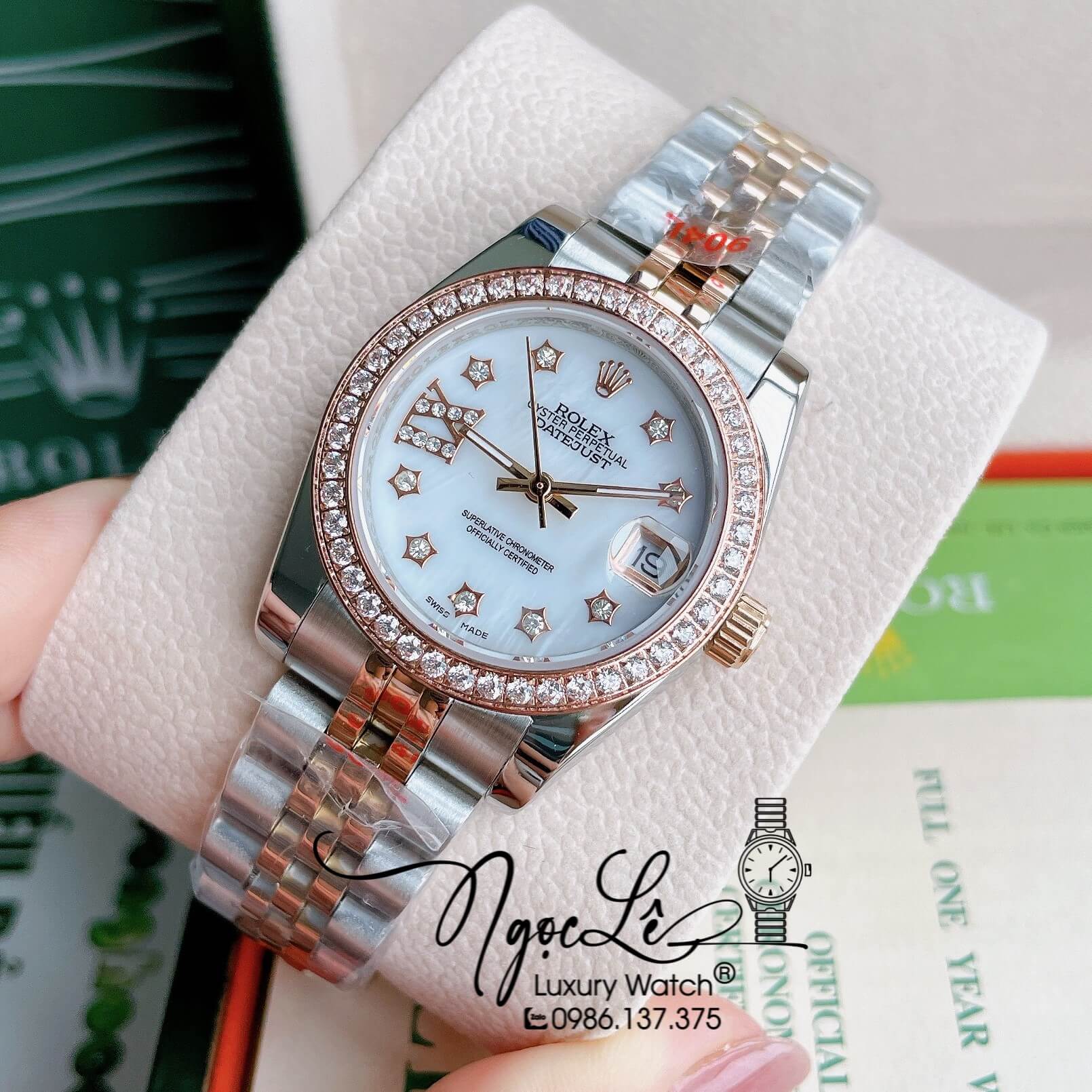 Đồng Hồ Nữ Rolex Datejust Pin Màu Demi Rose Mặt Trắng Xà Cừ Đính Đá Size 32mm