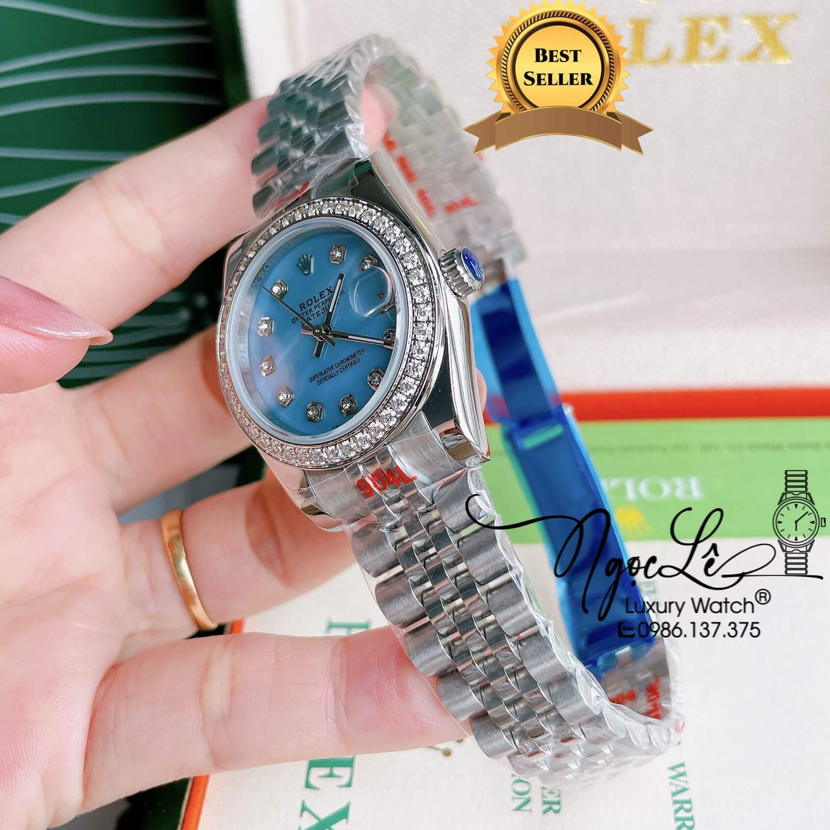 Đồng Hồ Nữ Rolex Datejust Pin Màu Vàng Mặt Xanh Dương Xà Cừ Đính Đá Size 32mm Full Box