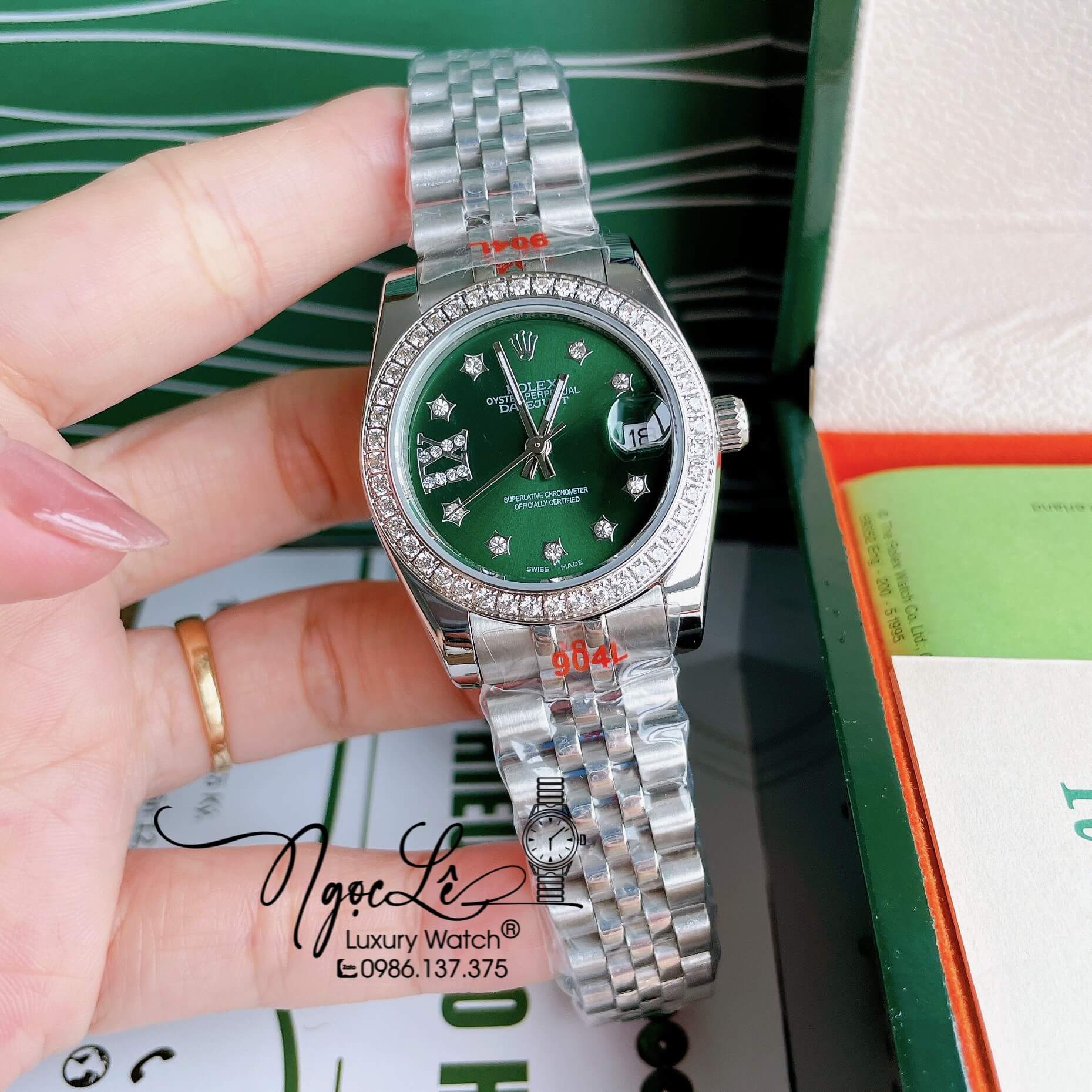 Đồng Hồ Nữ Rolex Datejust Pin Màu Bạc Mặt Xanh Oliu Đính Đá Size 32mm