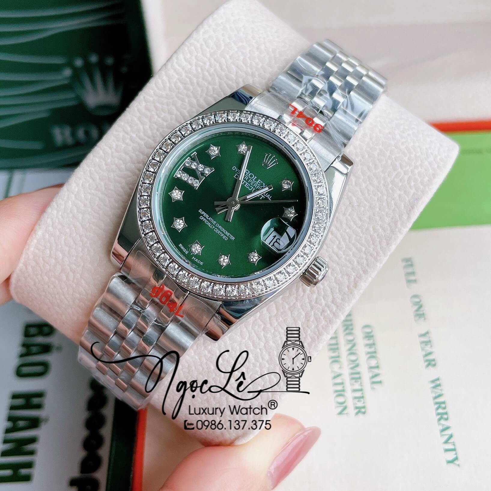 Đồng Hồ Nữ Rolex Datejust Pin Màu Bạc Mặt Xanh Oliu Đính Đá Size 32mm