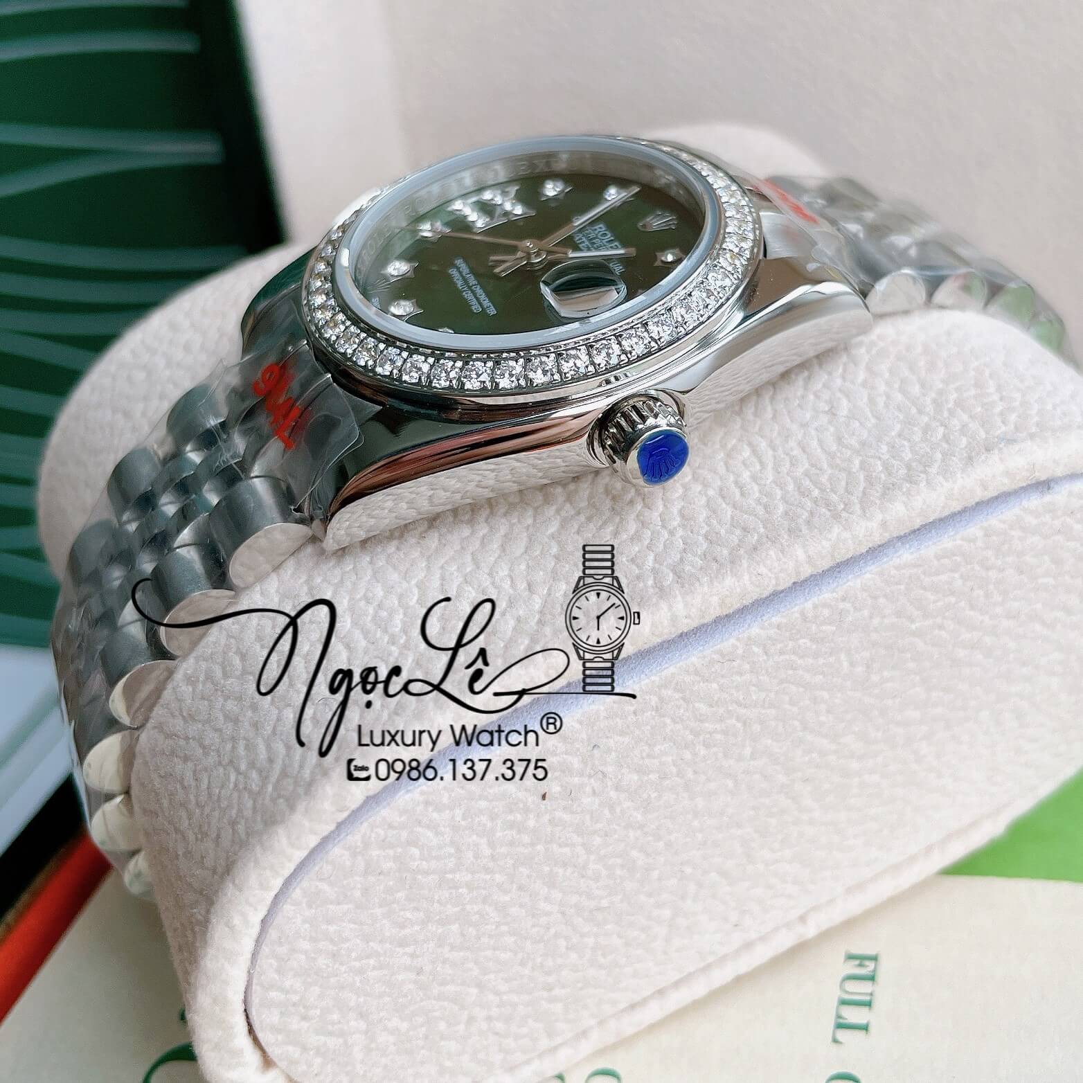 Đồng Hồ Nữ Rolex Datejust Pin Màu Bạc Mặt Xanh Oliu Đính Đá Size 32mm