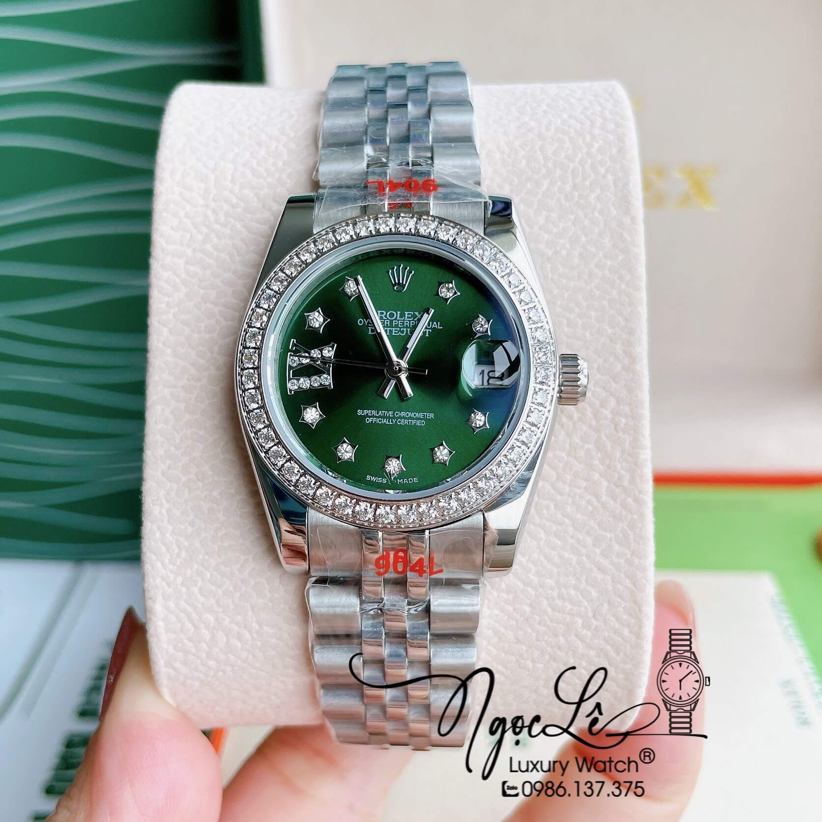 Đồng Hồ Nữ Rolex Datejust Pin Màu Bạc Mặt Xanh Oliu Đính Đá Size 32mm