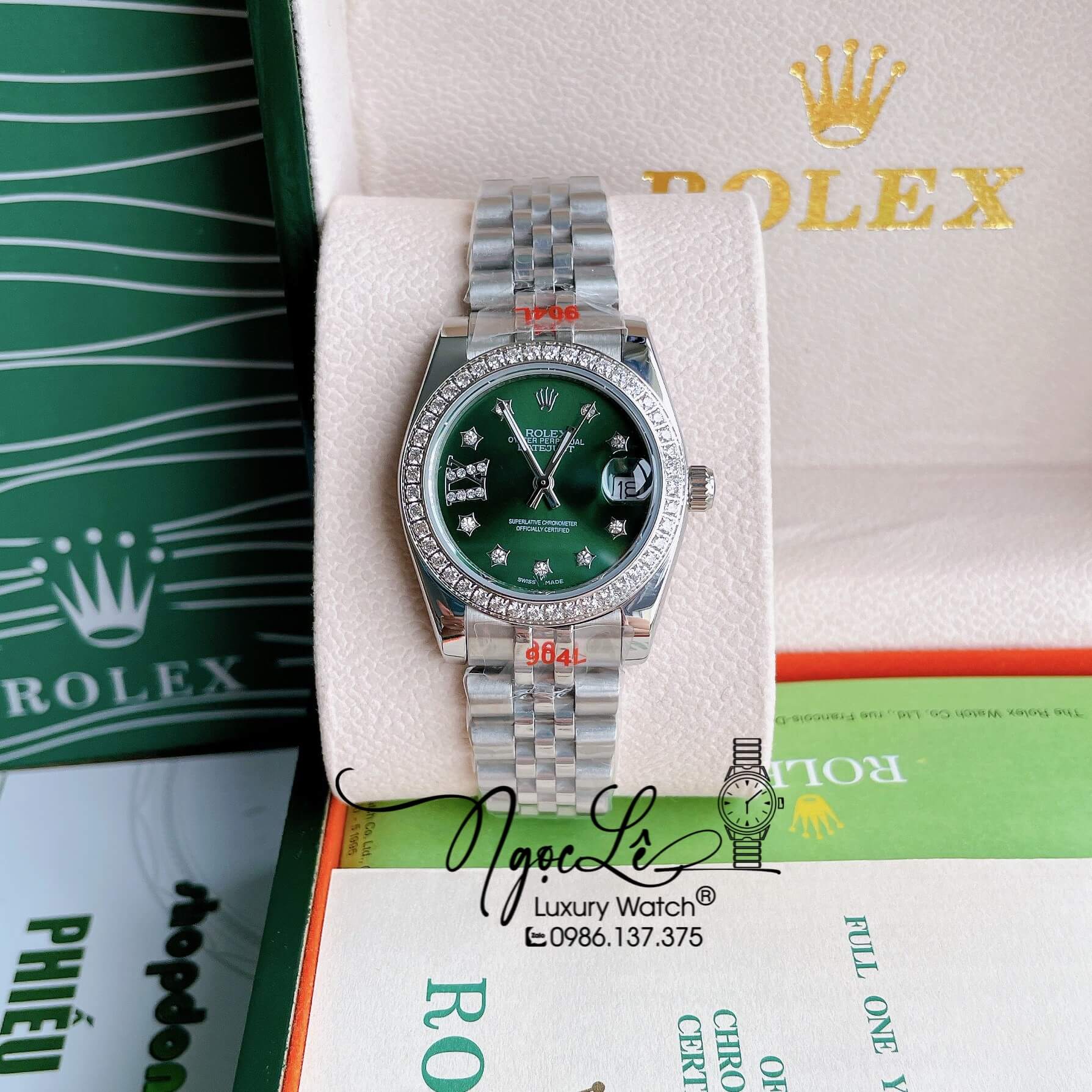 Đồng Hồ Nữ Rolex Datejust Pin Màu Bạc Mặt Xanh Oliu Đính Đá Size 32mm