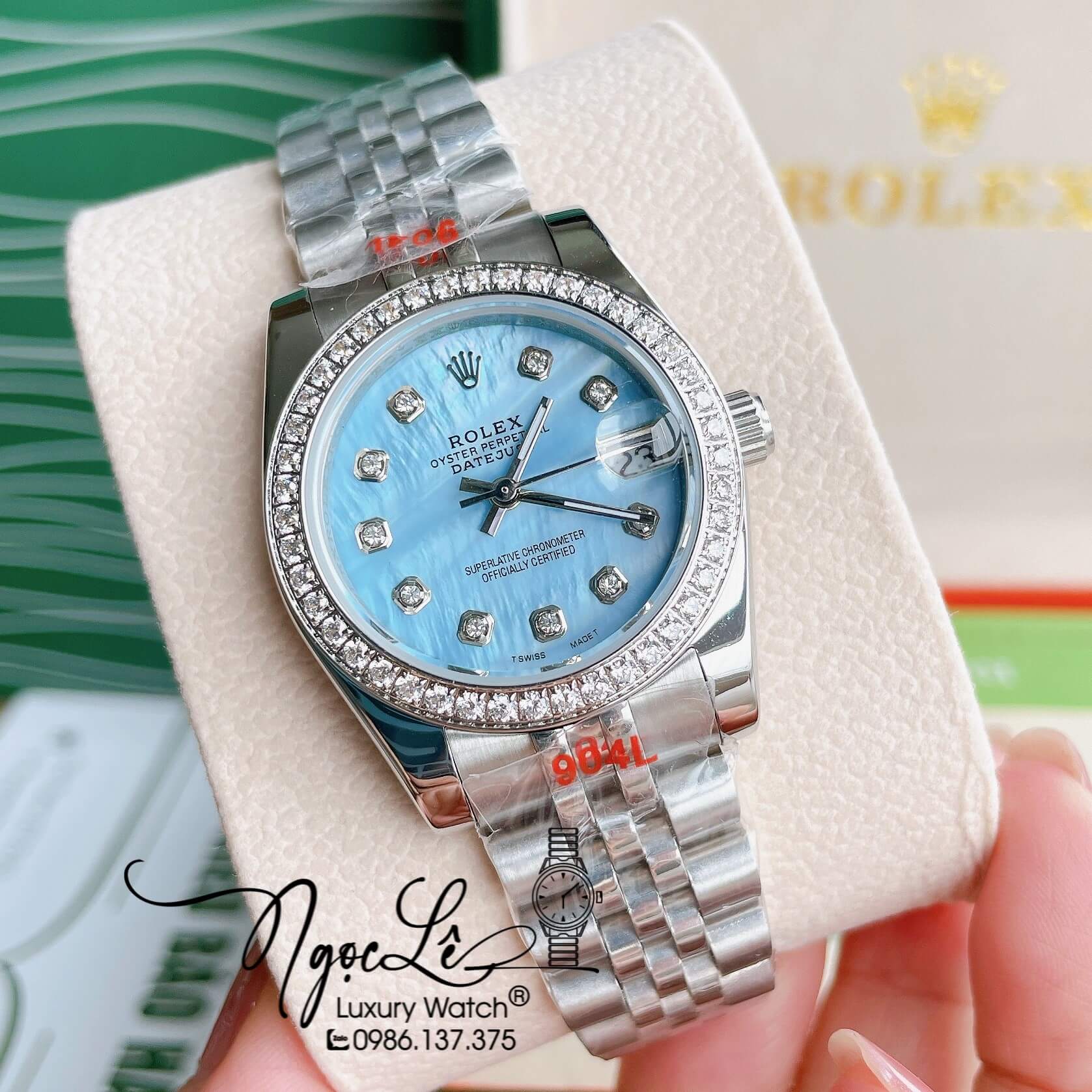 Đồng Hồ Nữ Rolex Datejust Pin Màu Vàng Mặt Xanh Dương Xà Cừ Đính Đá Size 32mm Full Box
