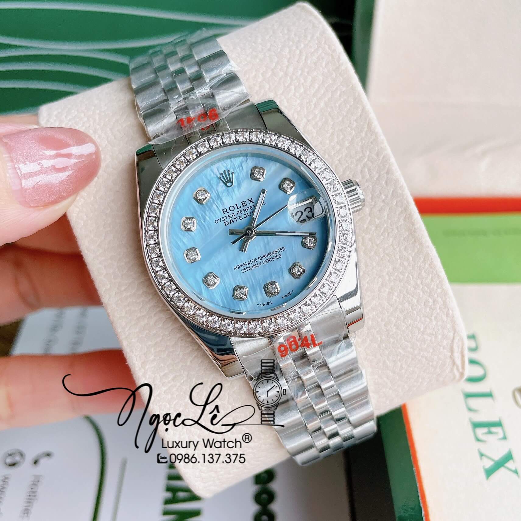 Đồng Hồ Nữ Rolex Datejust Pin Màu Vàng Mặt Xanh Dương Xà Cừ Đính Đá Size 32mm Full Box