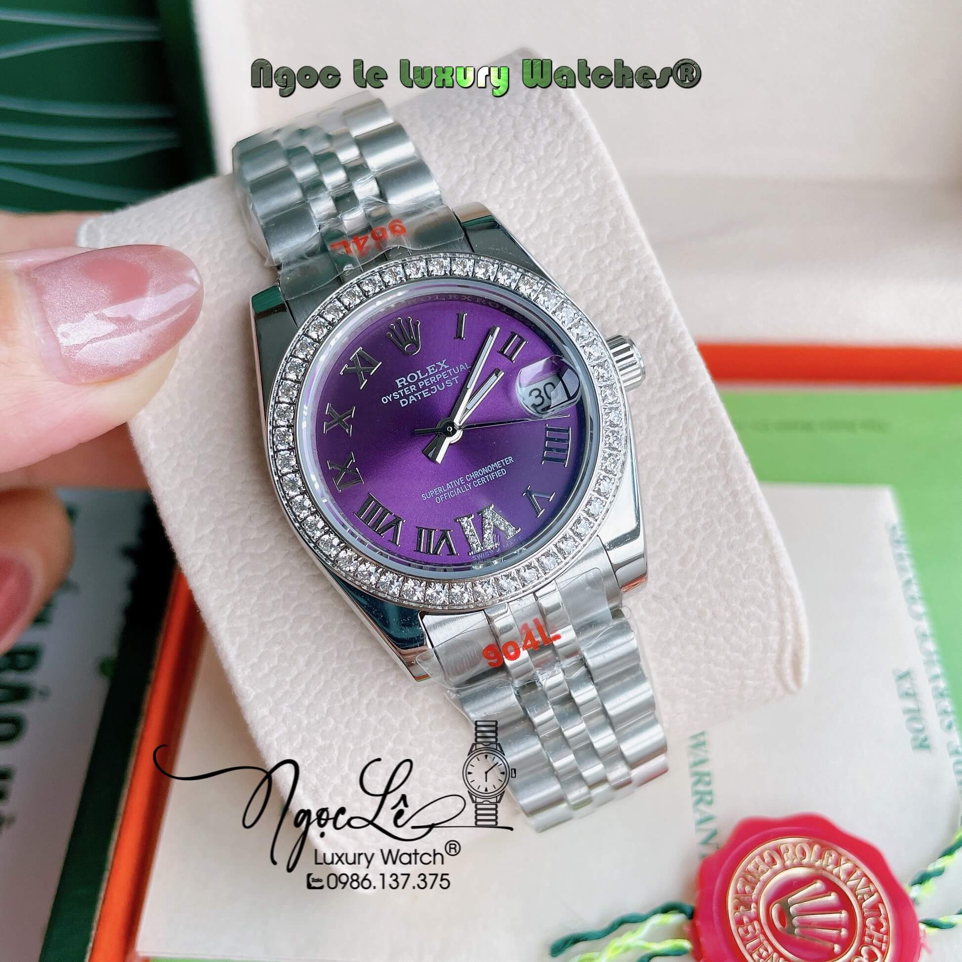 Đồng Hồ Nữ Rolex Datejust Pin Màu Bạc Mặt Tím Đính Đá Size 32mm Full Box