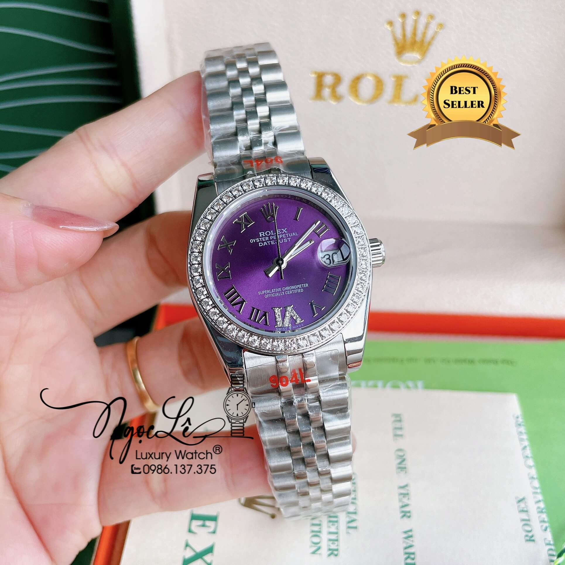 Đồng Hồ Nữ Rolex Datejust Pin Màu Bạc Mặt Tím Đính Đá Size 32mm Full Box