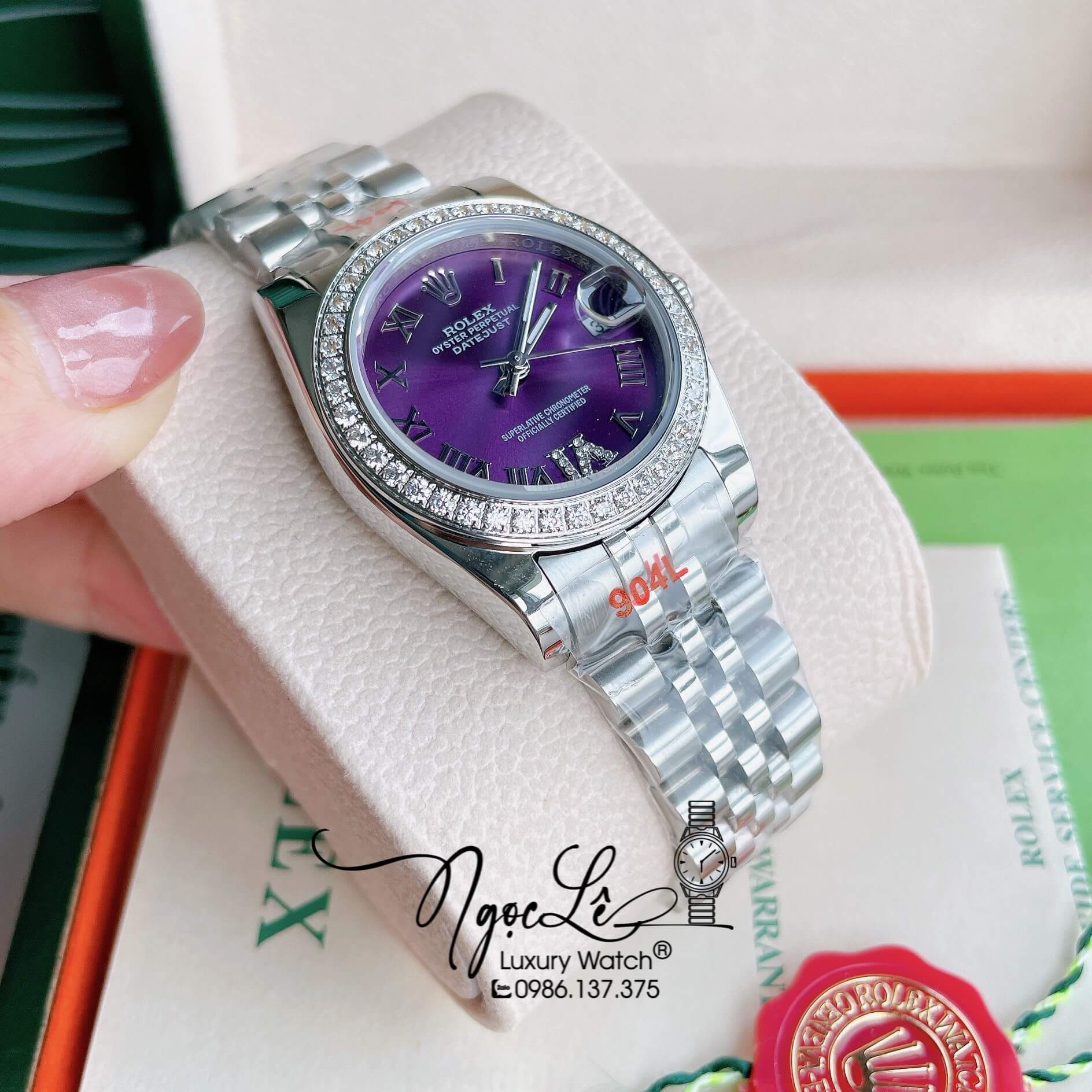 Đồng Hồ Nữ Rolex Datejust Pin Màu Bạc Mặt Tím Đính Đá Size 32mm Full Box
