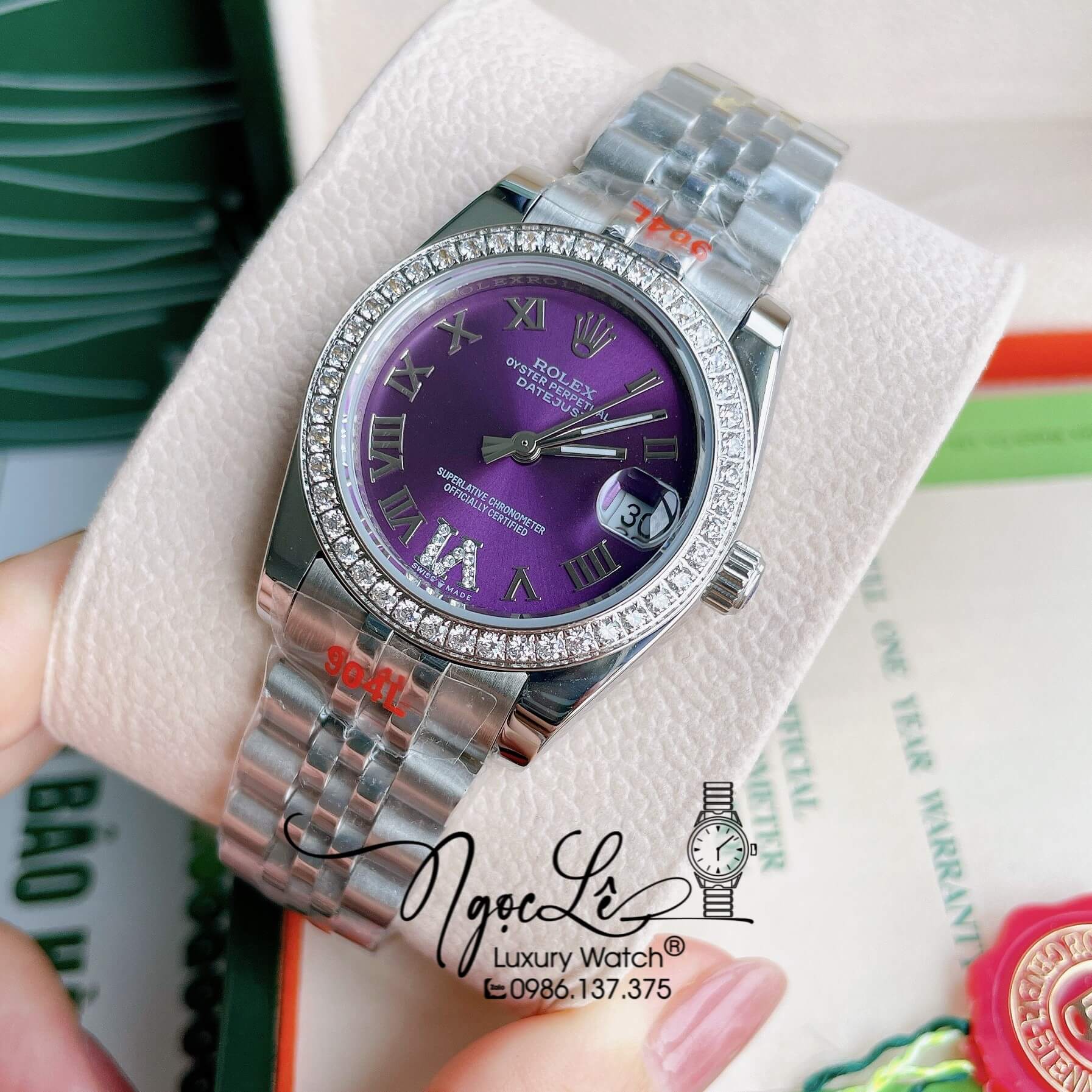 Đồng Hồ Nữ Rolex Datejust Pin Màu Bạc Mặt Tím Đính Đá Size 32mm Full Box