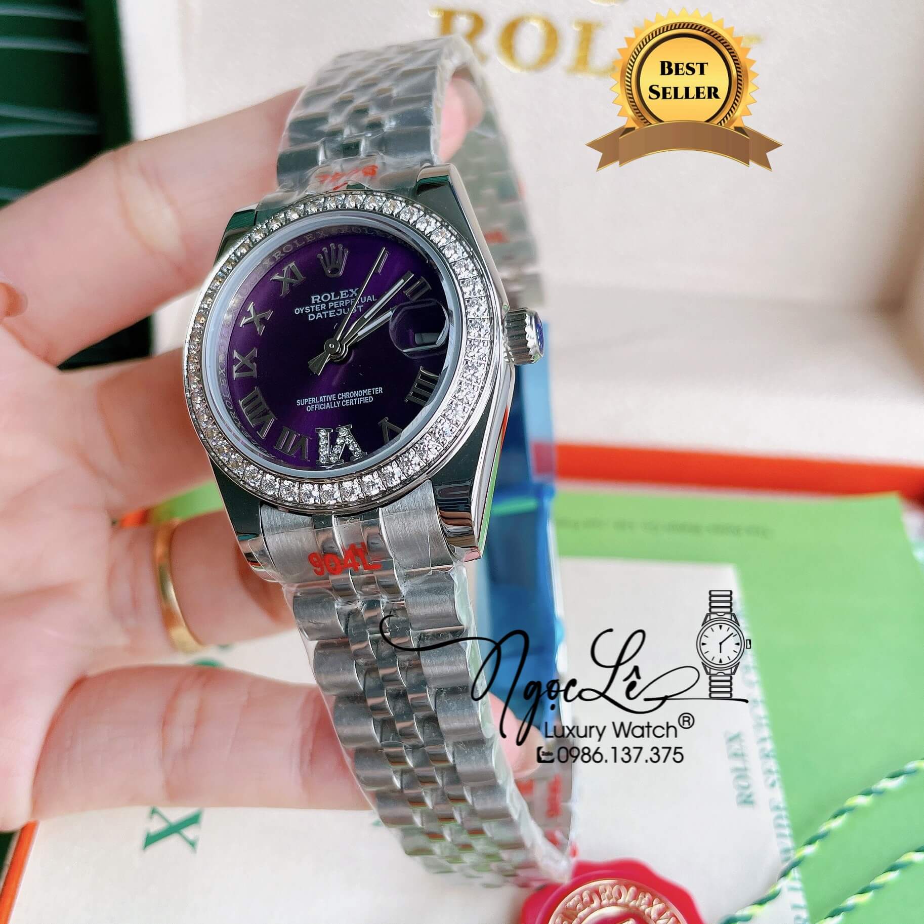 Đồng Hồ Nữ Rolex Datejust Pin Màu Bạc Mặt Tím Đính Đá Size 32mm Full Box