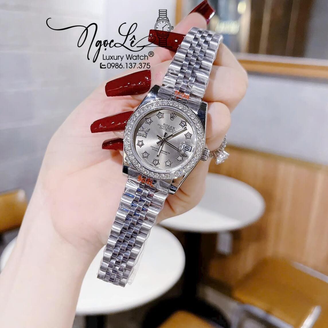 Đồng Hồ Nữ Rolex Datejust Pin Màu Bạc Mặt Xám Đính Đá Size 32mm
