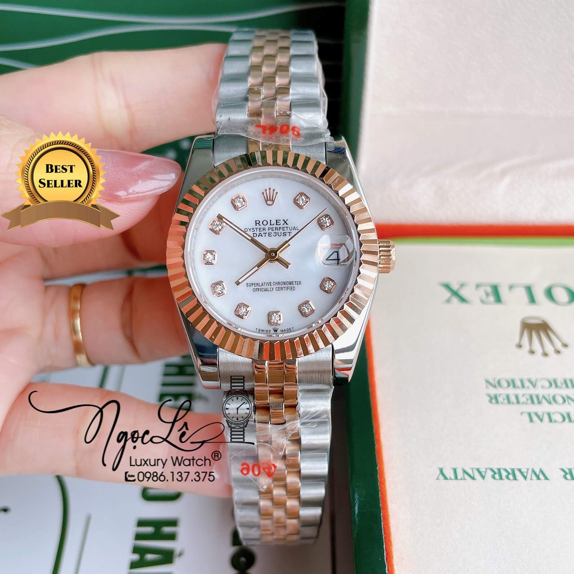 Đồng Hồ Nữ Rolex Datejust Pin Màu Demi Rose Mặt Trắng Xà Cừ Khía Size 32mm