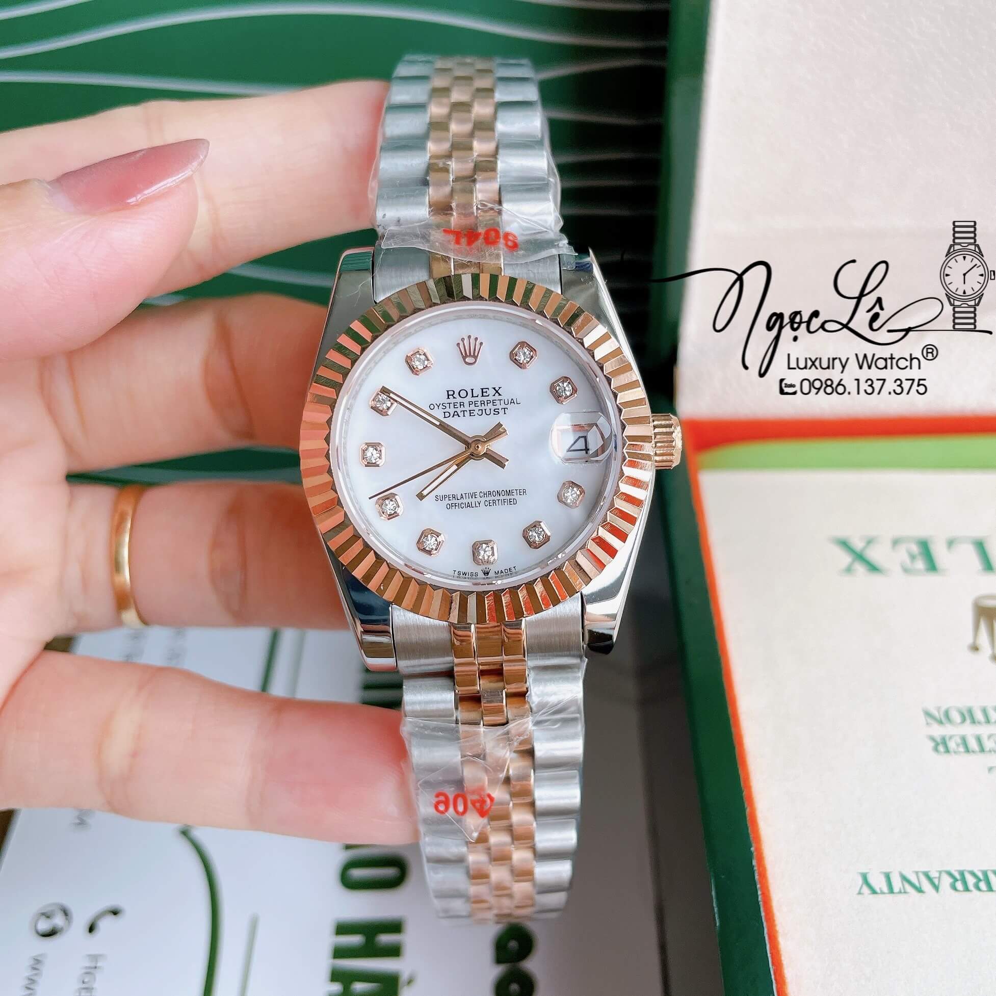 Đồng Hồ Nữ Rolex Datejust Pin Màu Demi Rose Mặt Trắng Xà Cừ Khía Size 32mm