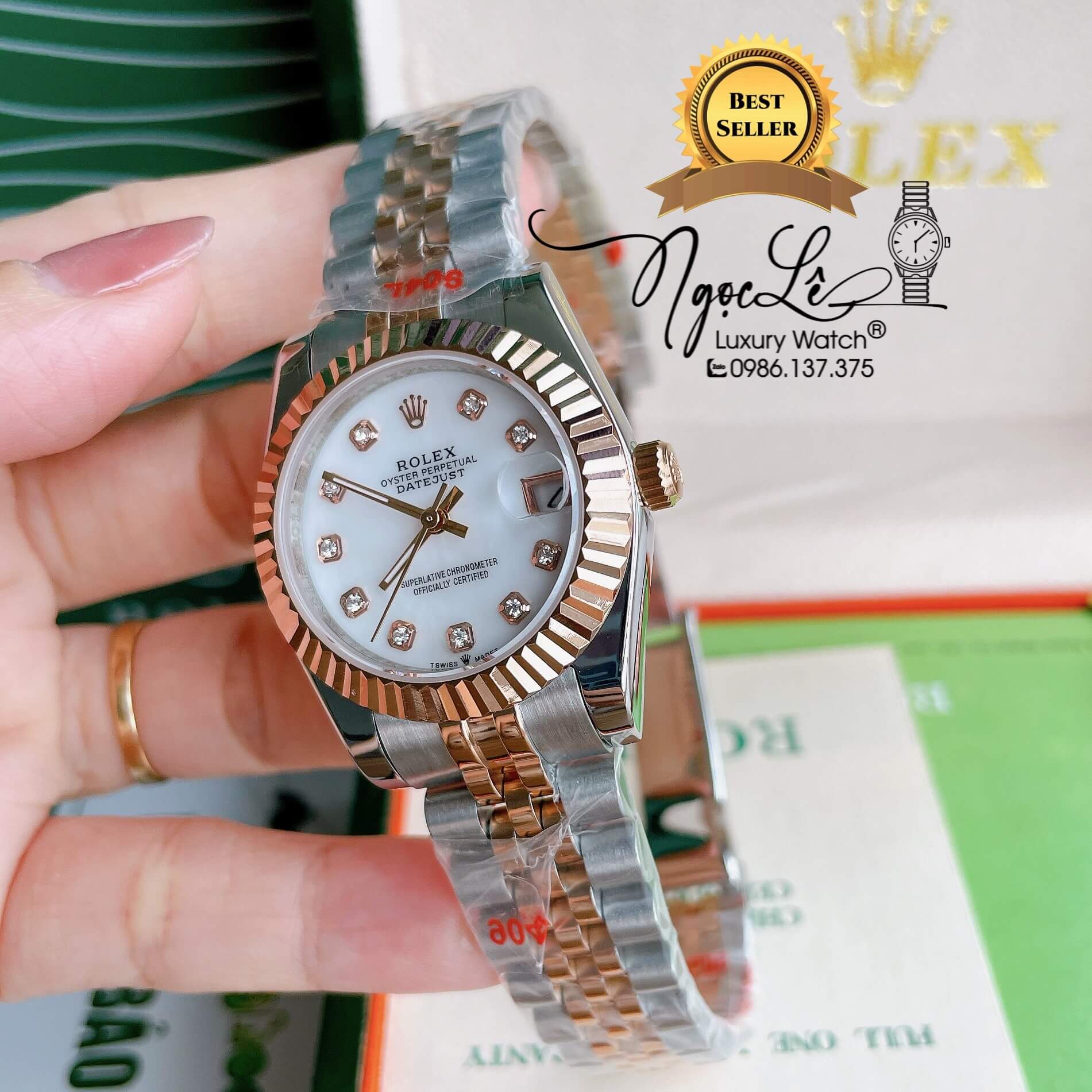 Đồng Hồ Nữ Rolex Datejust Pin Màu Demi Rose Mặt Trắng Xà Cừ Khía Size 32mm