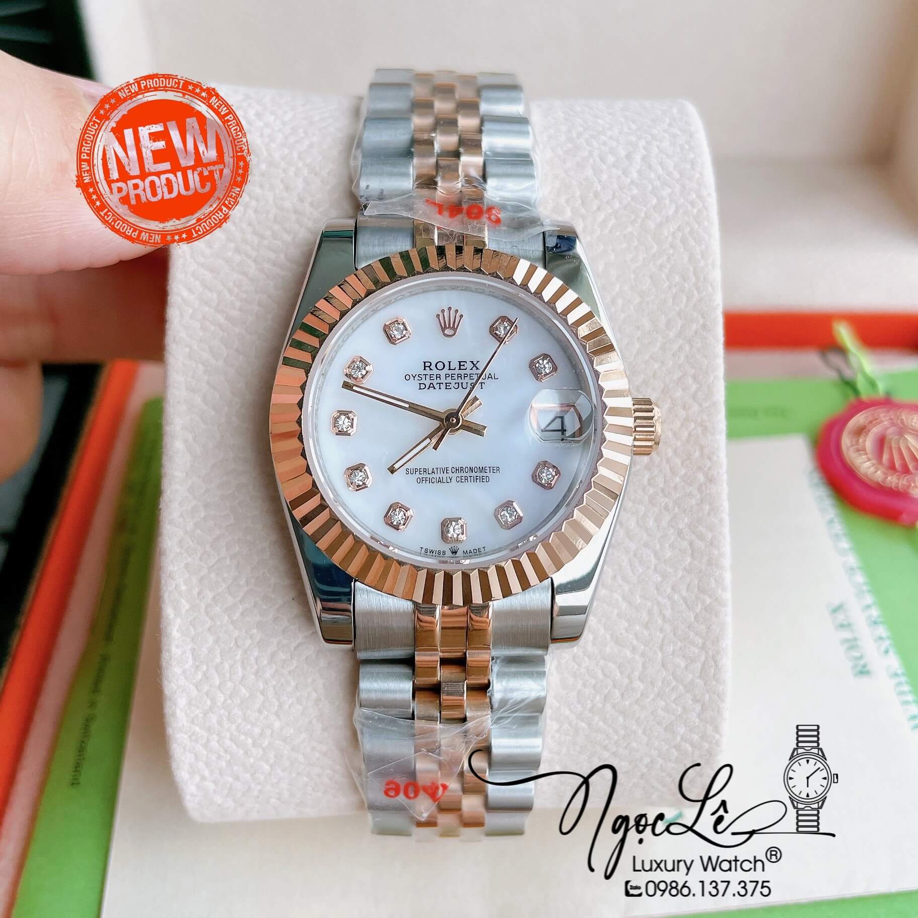 Đồng Hồ Nữ Rolex Datejust Pin Màu Demi Rose Mặt Trắng Xà Cừ Khía Size 32mm