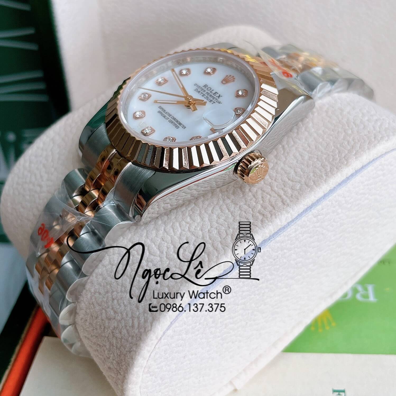 Đồng Hồ Nữ Rolex Datejust Pin Màu Demi Rose Mặt Trắng Xà Cừ Khía Size 32mm