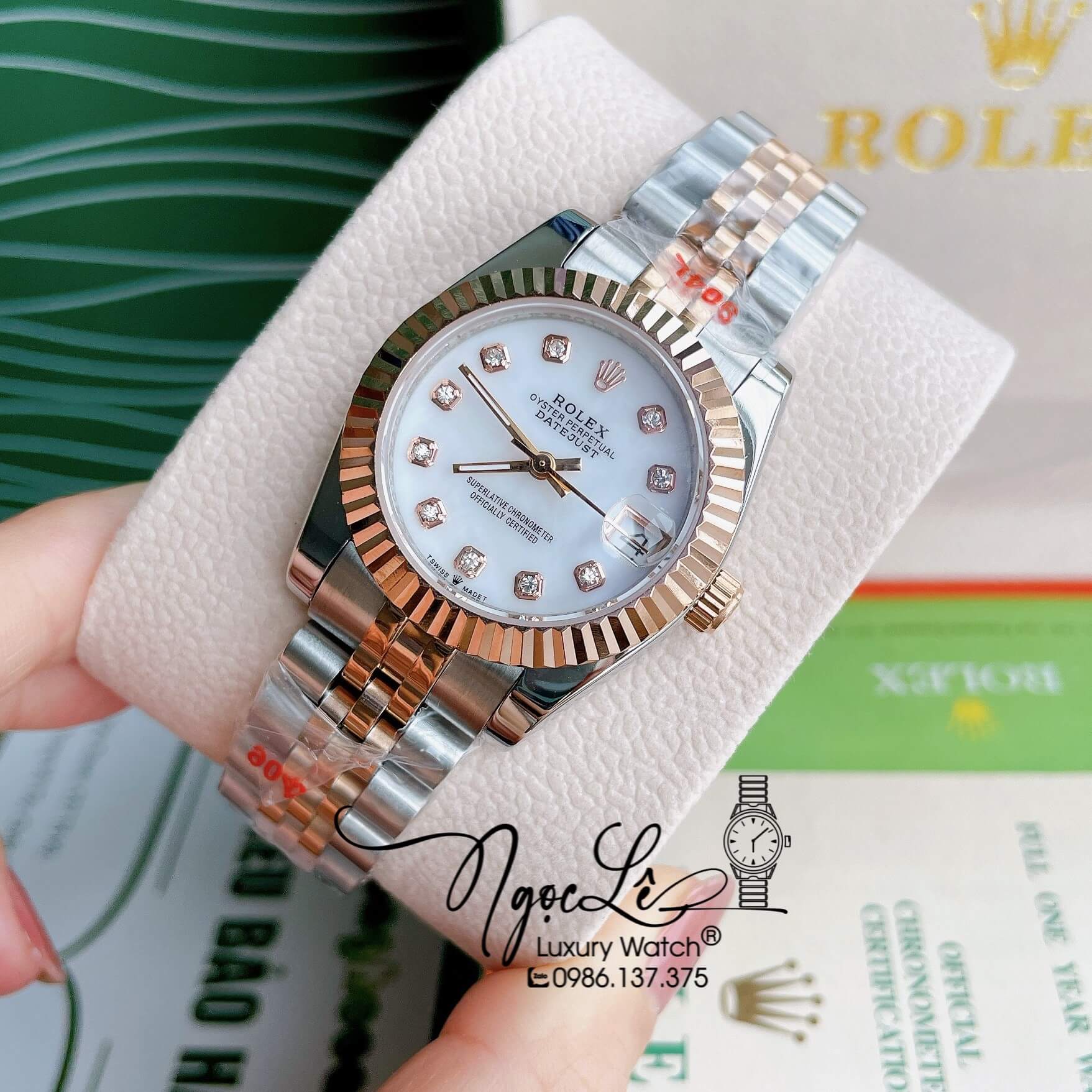 Đồng Hồ Nữ Rolex Datejust Pin Màu Demi Rose Mặt Trắng Xà Cừ Khía Size 32mm