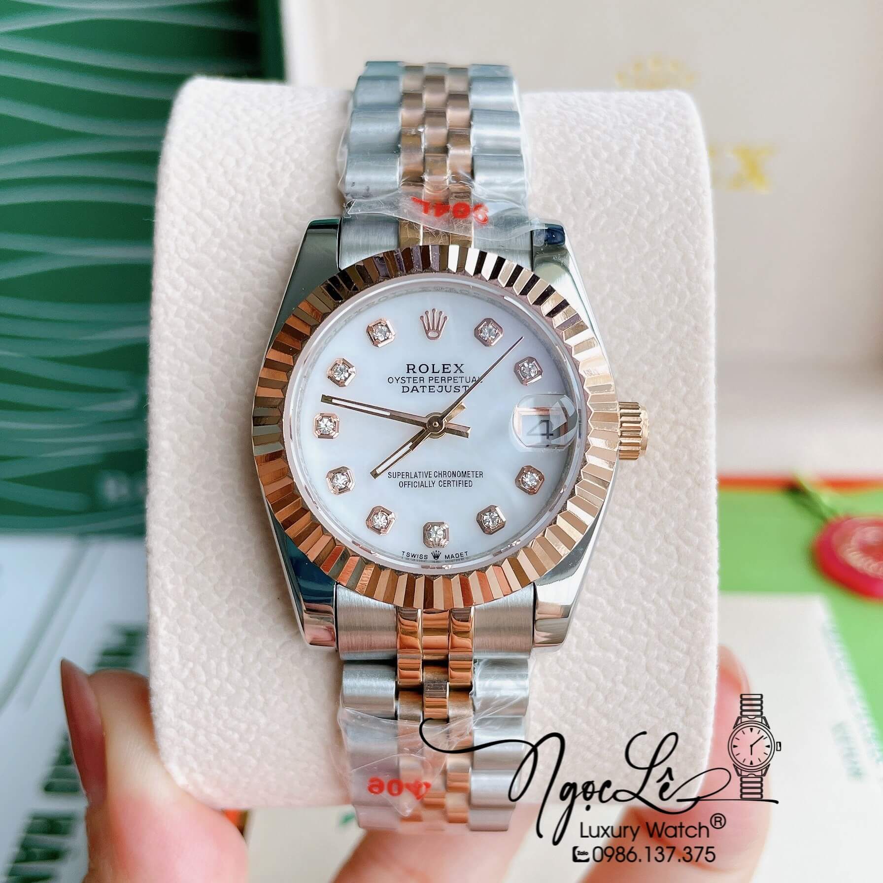 Đồng Hồ Nữ Rolex Datejust Pin Màu Demi Rose Mặt Trắng Xà Cừ Khía Size 32mm