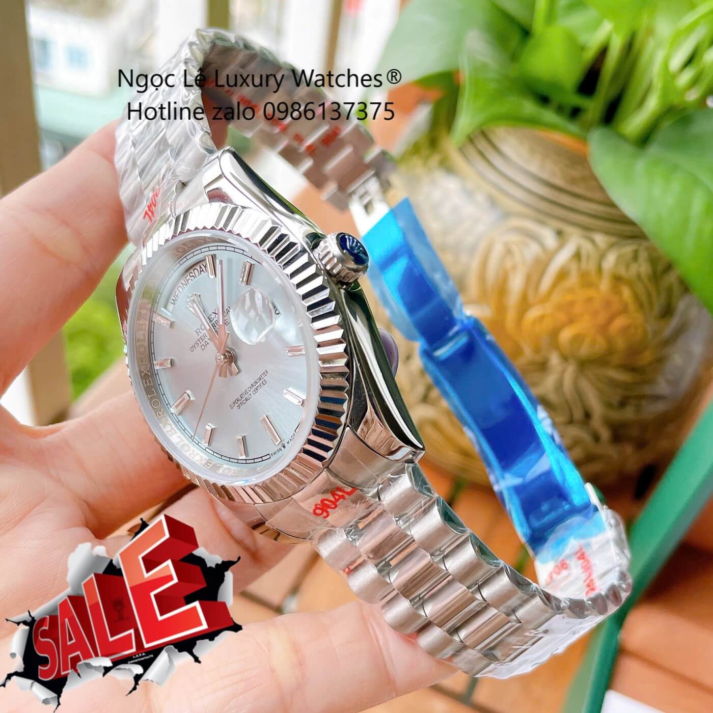 Đồng Hồ Rolex Day-Date Tự Động Dây Thép Màu Bạc Mặt Xanh Nhạt Size 41mm - Niềng Khía