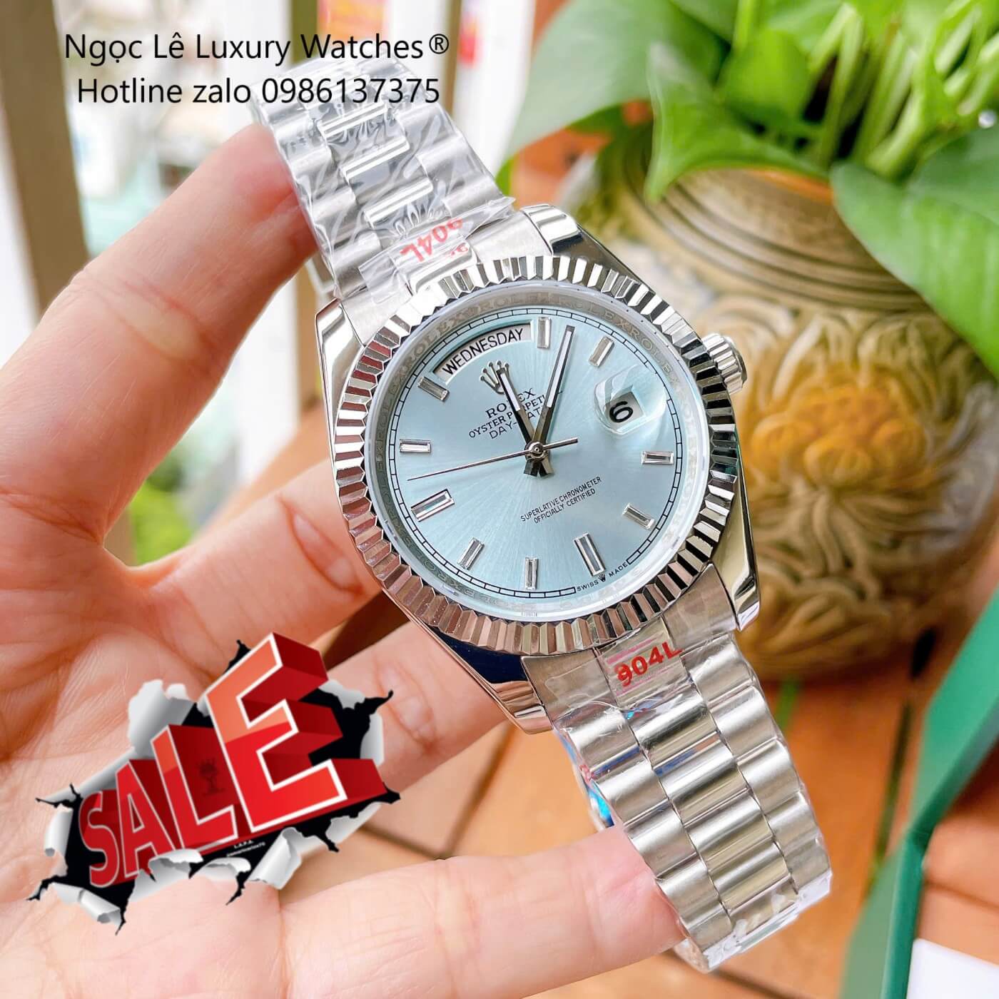 Đồng Hồ Rolex Day-Date Tự Động Dây Thép Màu Bạc Mặt Xanh Nhạt Size 41mm - Niềng Khía