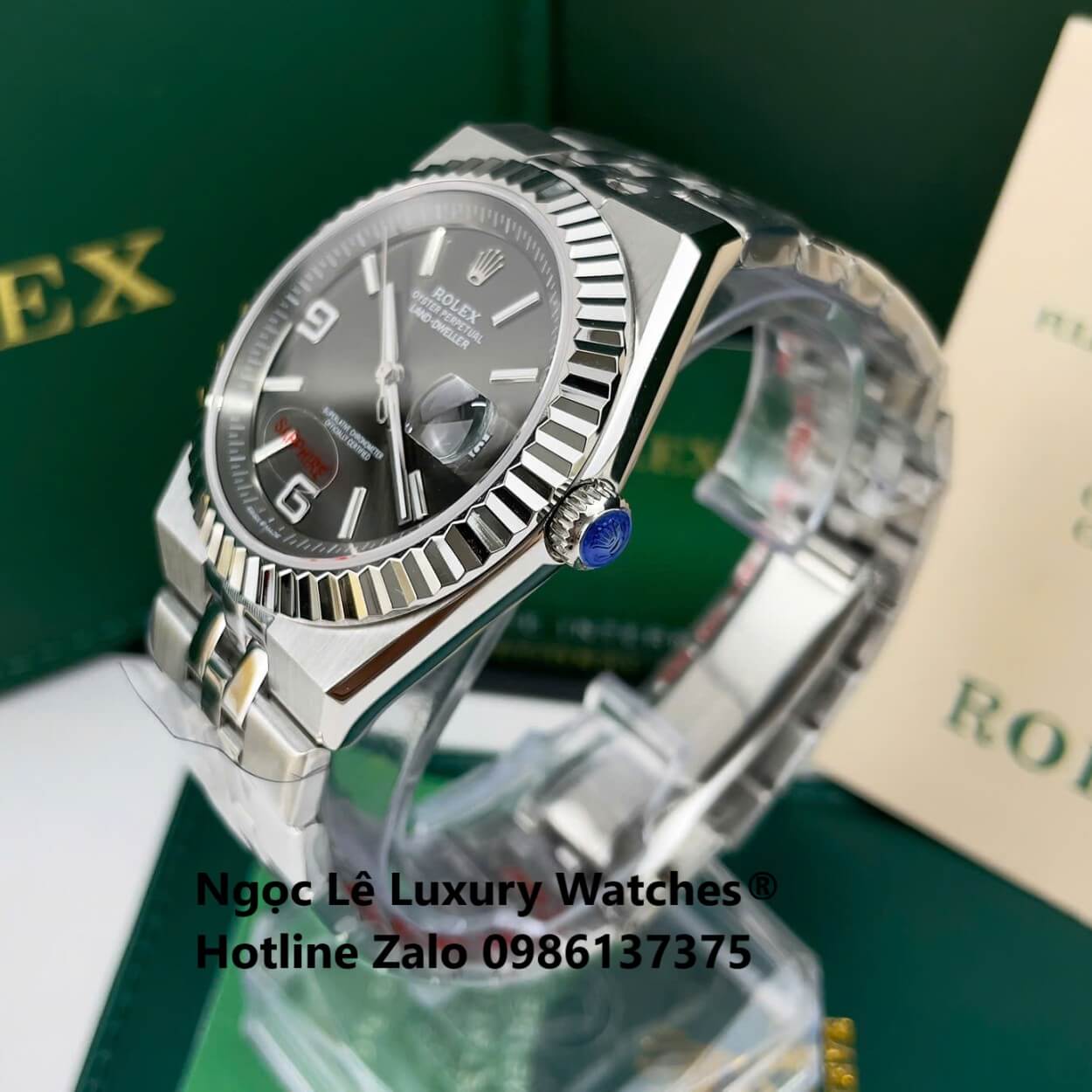 Đồng Hồ Rolex Land-Dweller Dây Kim Loại Bạc Mặt Đen Xám Size 40mm Vành Khía