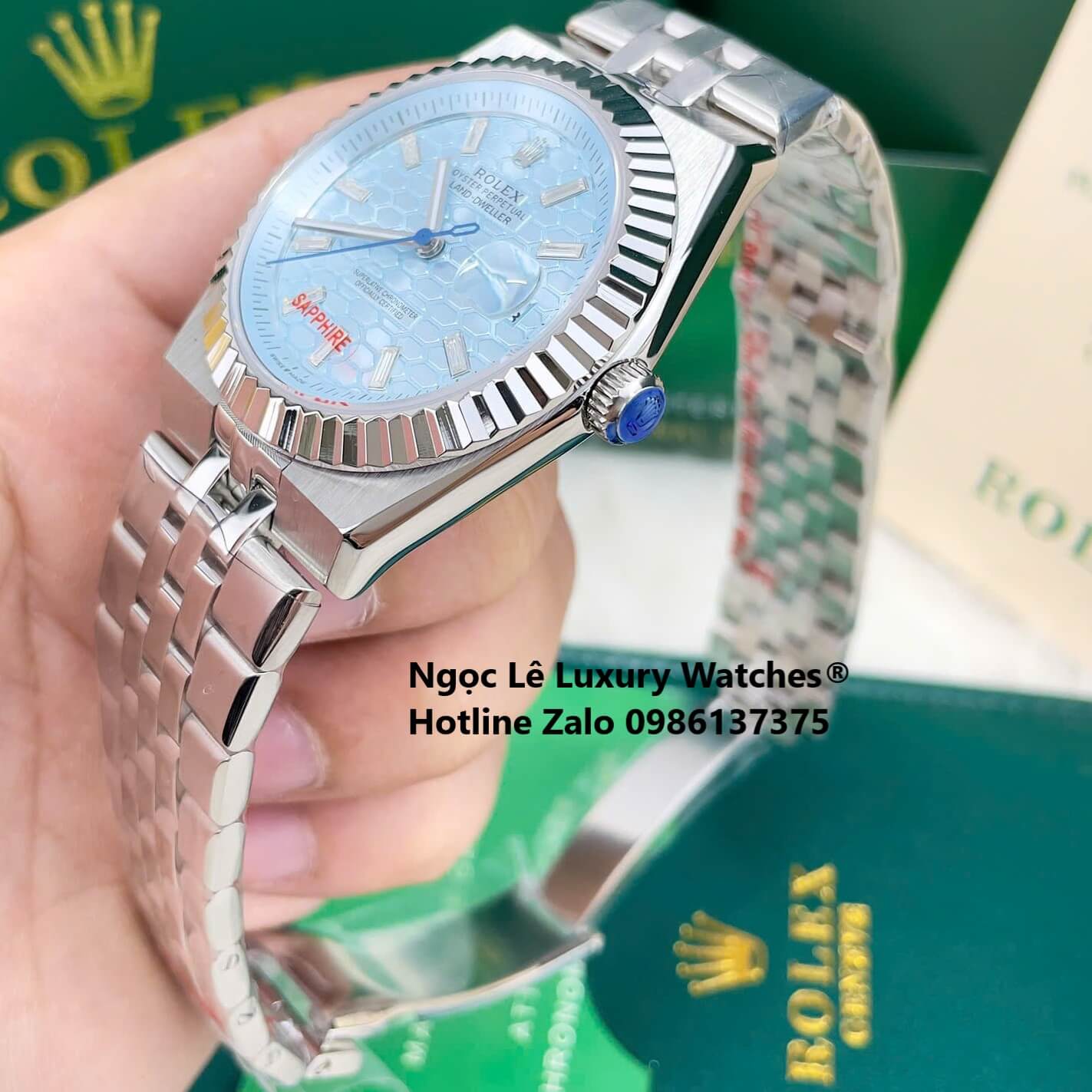 Đồng Hồ Rolex Land-Dweller Dây Kim Loại Bạc Mặt Xanh Dương Nhạt Họa Tiết Tổ Ong Size 40mm Vành Khía
