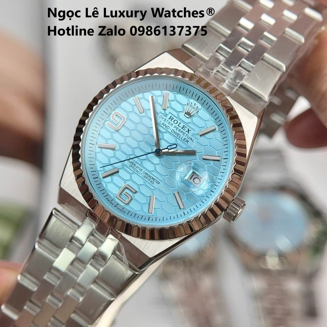 Đồng Hồ Rolex Land-Dweller Dây Kim Loại Bạc Mặt Xanh Dương Nhạt Size 40mm Vành Khía