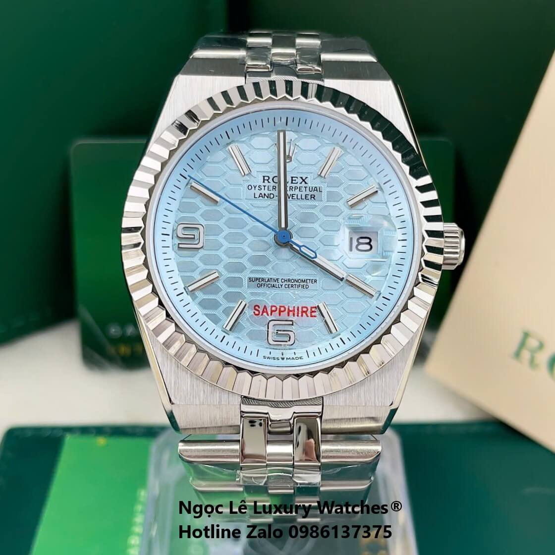 Đồng Hồ Rolex Land-Dweller Dây Kim Loại Bạc Mặt Xanh Dương Nhạt Size 40mm Vành Khía