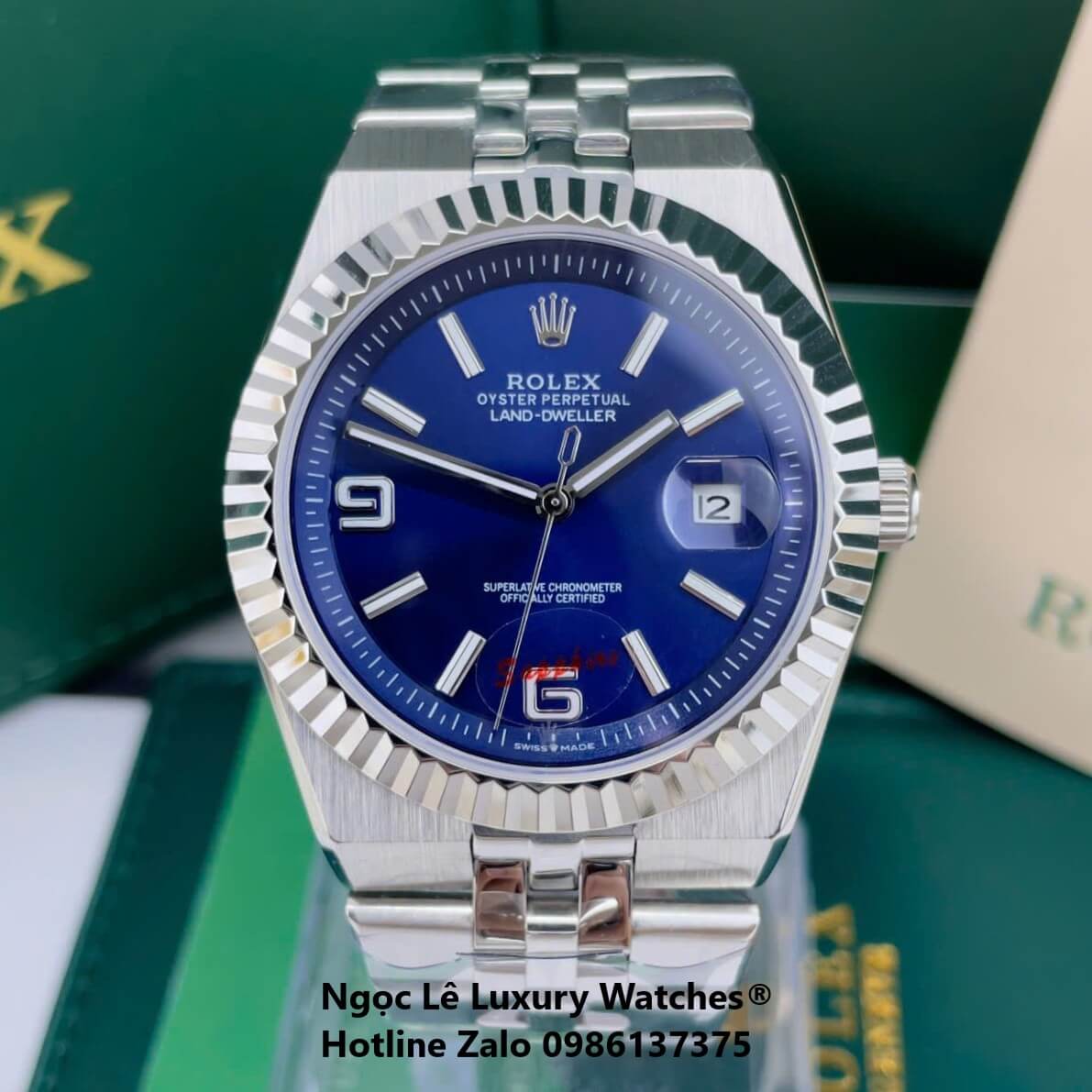 Đồng Hồ Rolex Land-Dweller Dây Kim Loại Bạc Mặt Xanh Dương Size 40mm Vành Khía