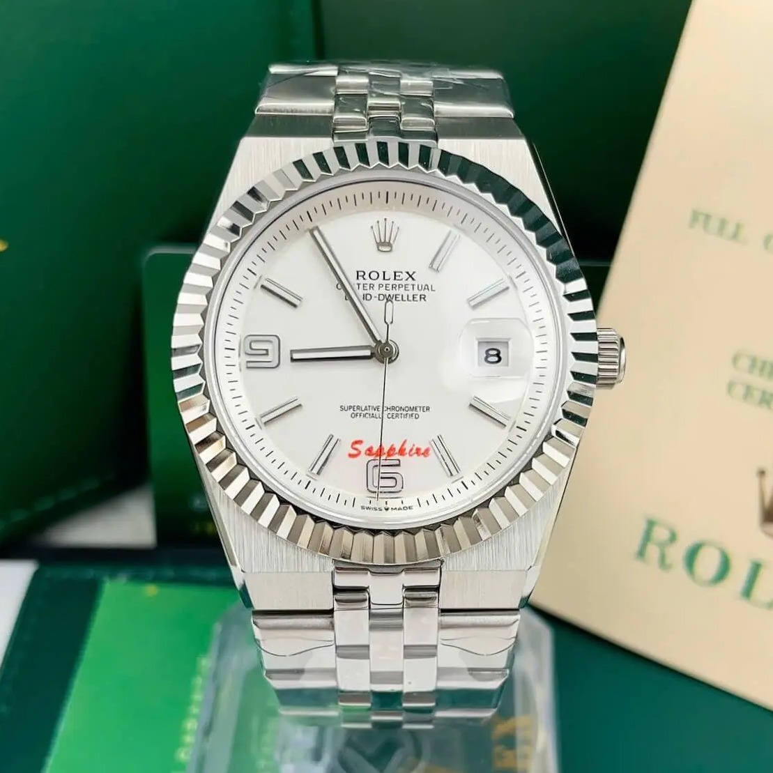 Đồng Hồ Rolex Land-Dweller Dây Kim Loại Bạc Mặt Trắng Size 40mm Vành Khía