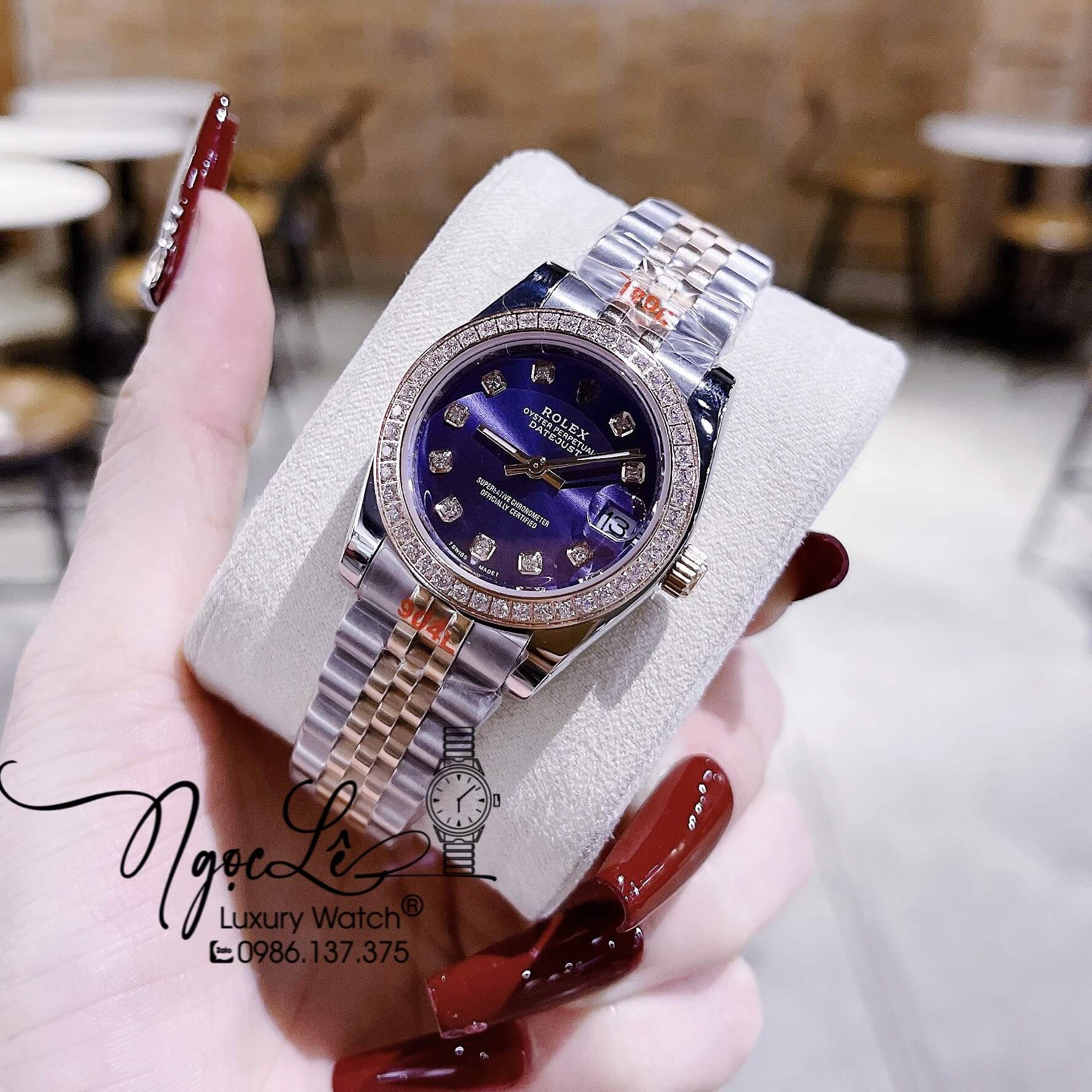 Đồng Hồ Nữ Rolex Datejust Pin Dây Kim Loại Demi Rose Mặt Tím Đính Đá Size 32mm