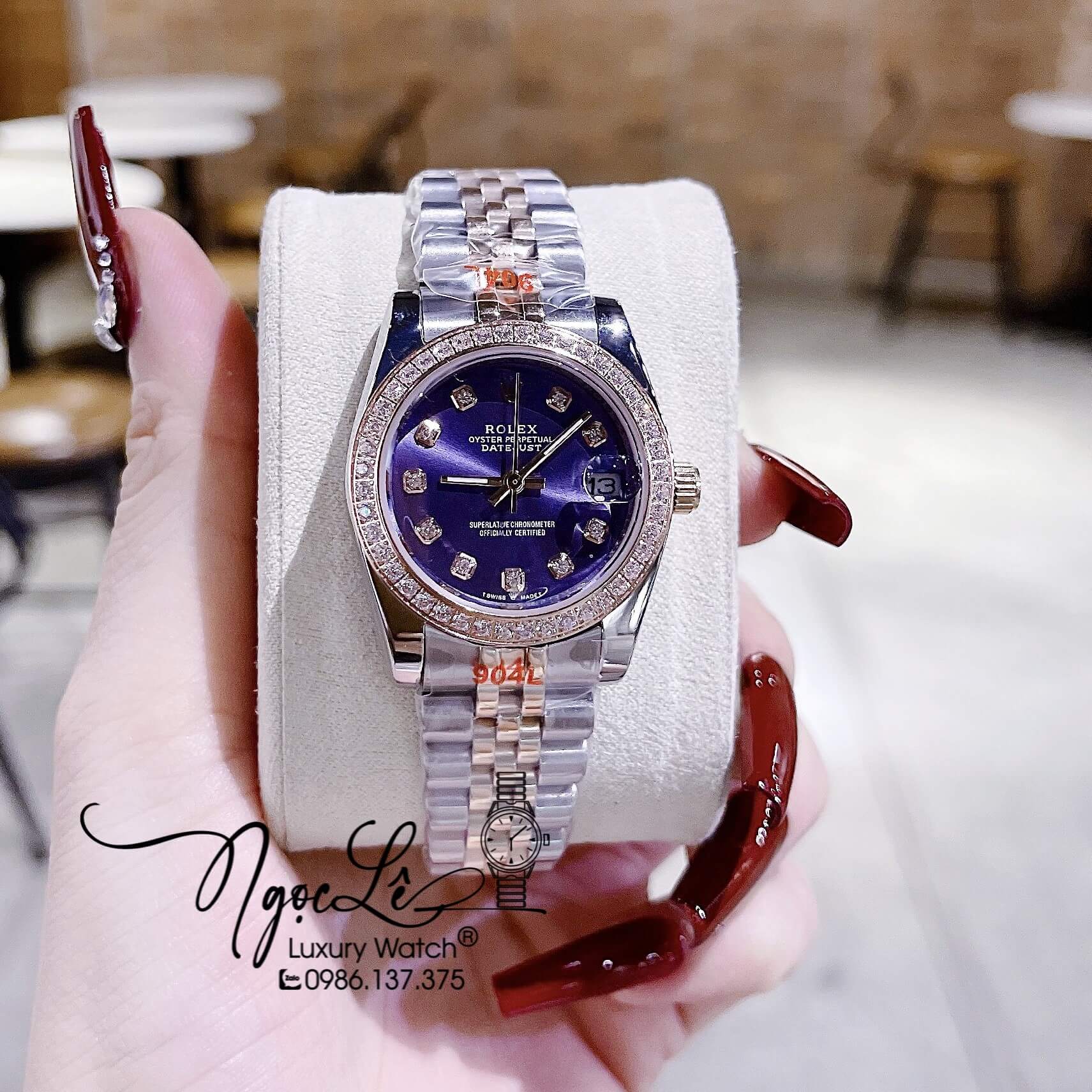 Đồng Hồ Nữ Rolex Datejust Pin Dây Kim Loại Demi Rose Mặt Tím Đính Đá Size 32mm
