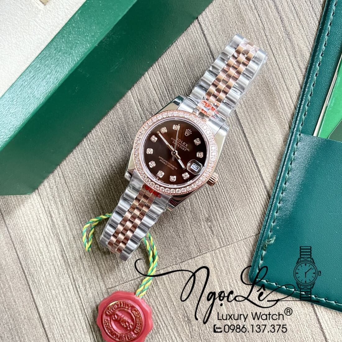 Đồng Hồ Nữ Rolex Datejust Dây Kim Loại Demi Rose Mặt Nâu Đính Đá 32mm