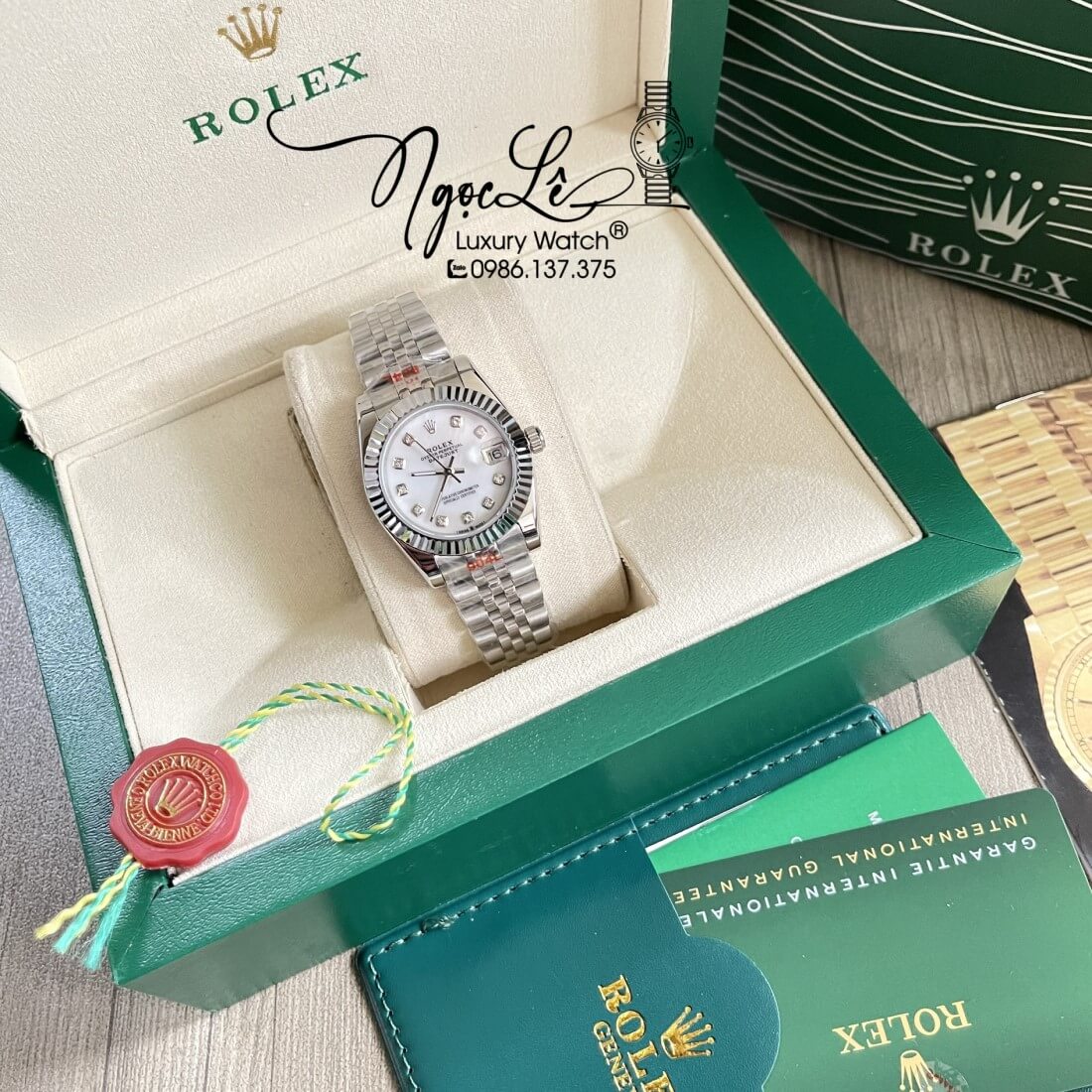 Đồng Hồ Nữ Rolex Datejust Máy Pin Niềng Khía 31mm Màu Bạc Mặt Xà Cừ
