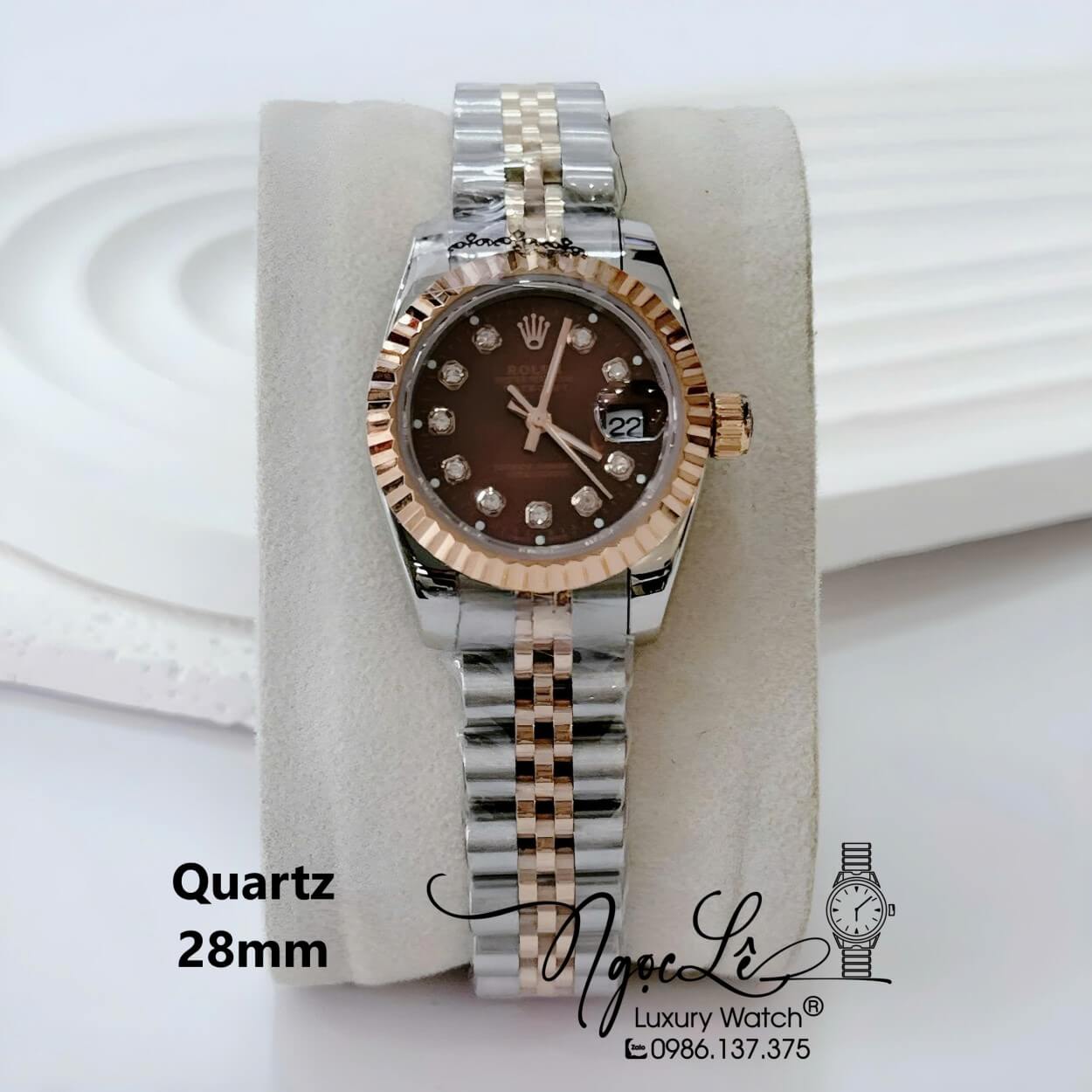 Đồng Hồ Nữ Rolex Datejust Pin Dây Kim Loại Demi Rose Mặt Nâu Size 28mm