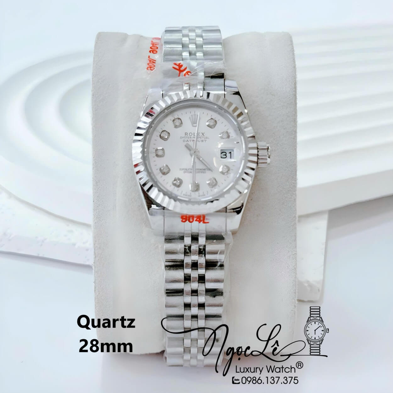 Đồng Hồ Nữ Rolex Datejust Pin Dây Kim Loại Bạc Mặt Trắng Size 28mm