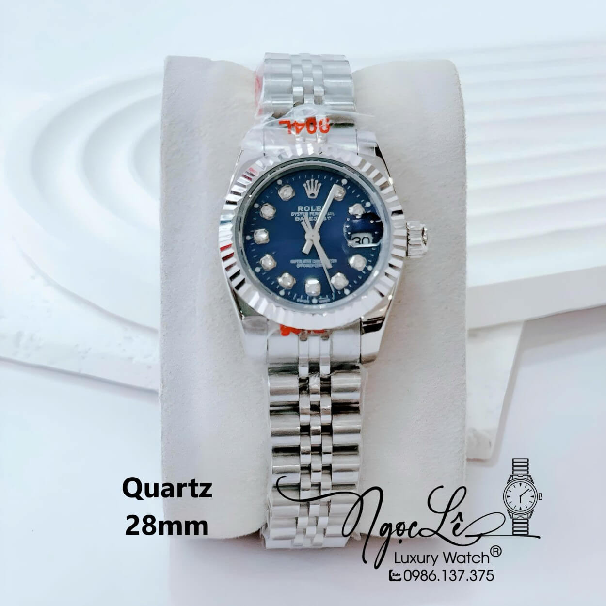 Đồng Hồ Nữ Rolex Datejust Pin Dây Kim Loại Bạc Mặt Xanh Dương Size 28mm